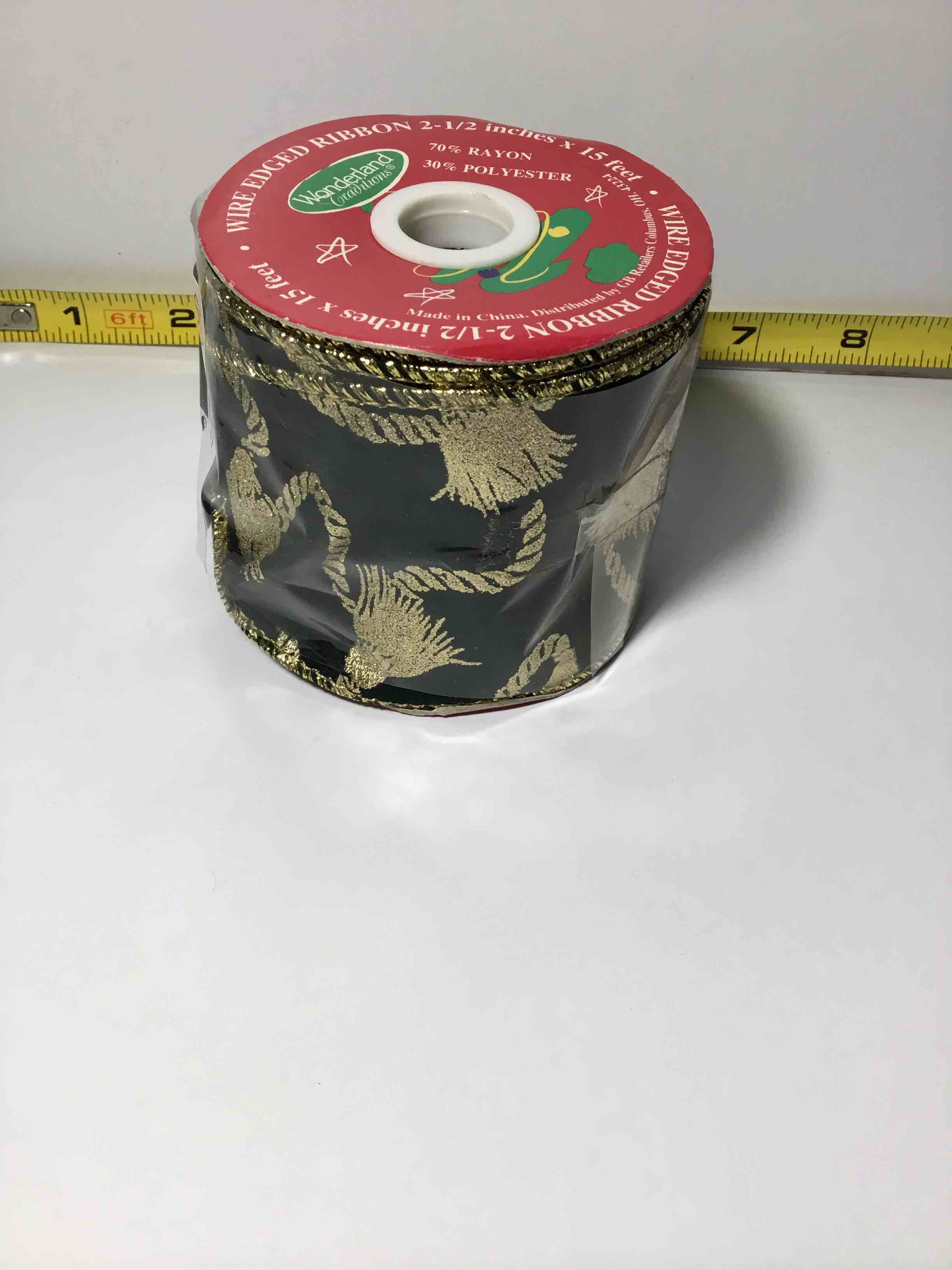 This is a roll of wire-edged ribbon from the brand "Wonderland Traditions