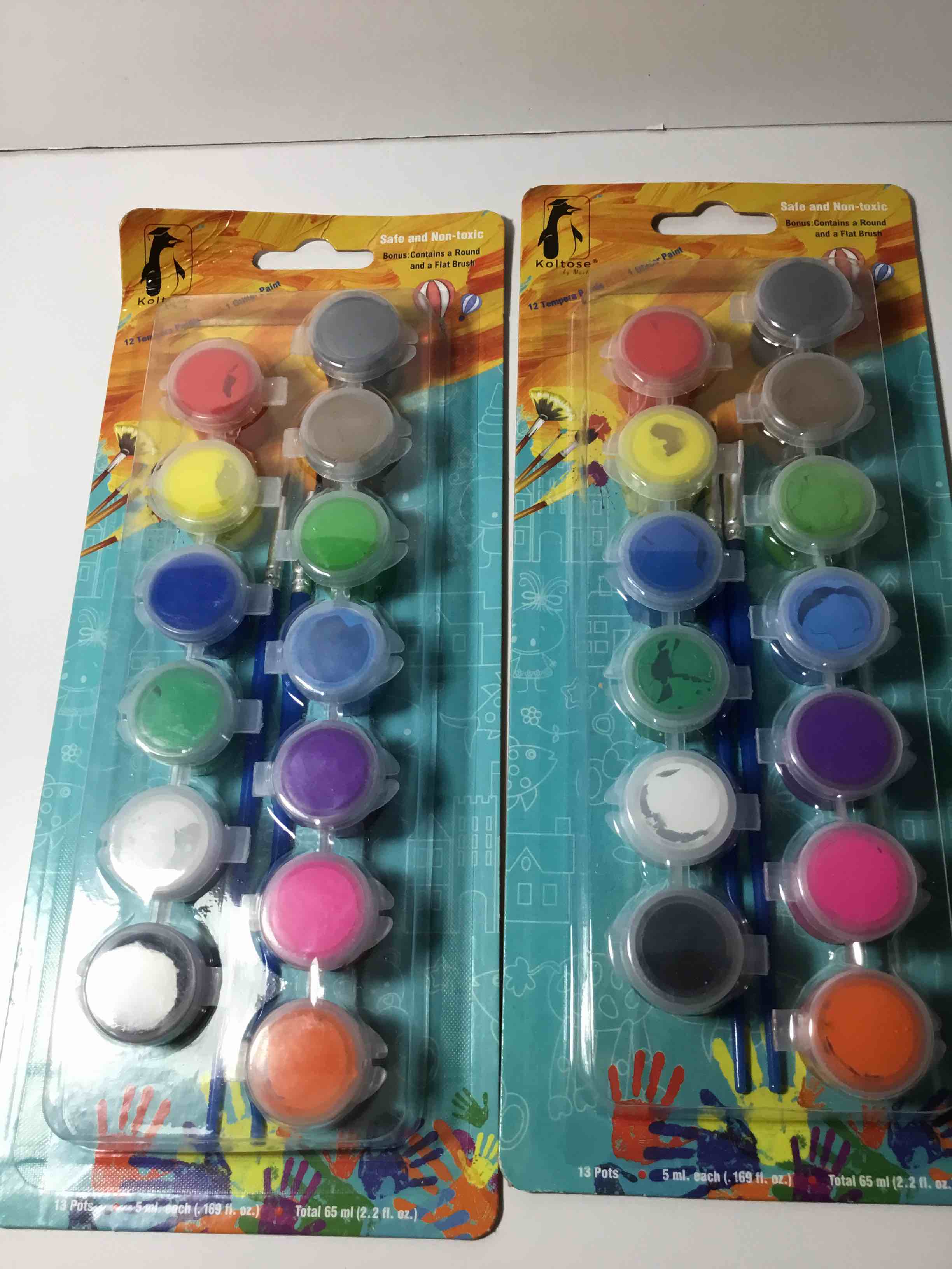 This is a Koltose by Mash paint set. It is a set of 12 paint pots and includes a round and a flat brush. 