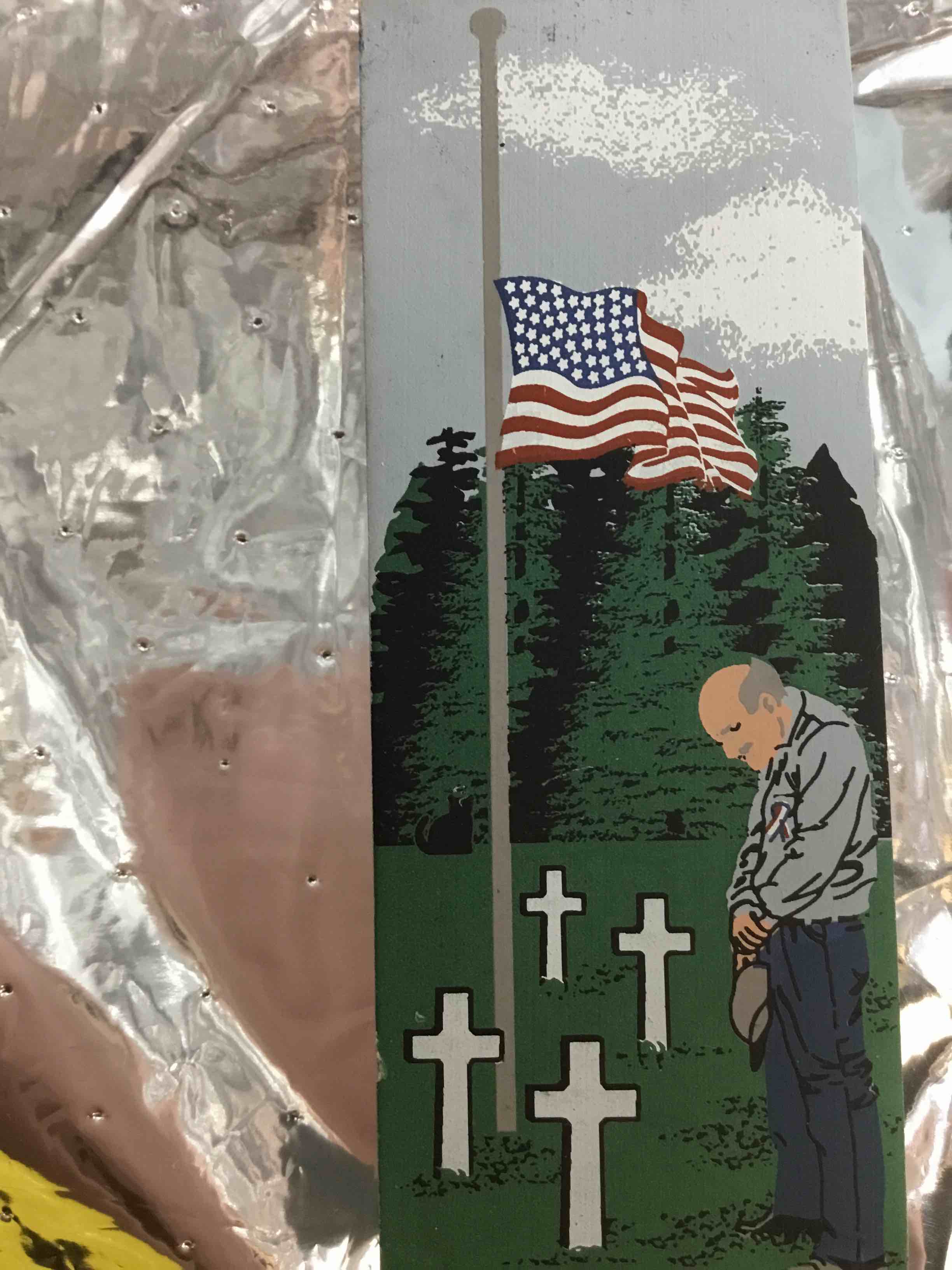 This is a Cat's Meow Village wooden shelf sitter. The piece is a tribute to the victims of the September 11th attacks. 