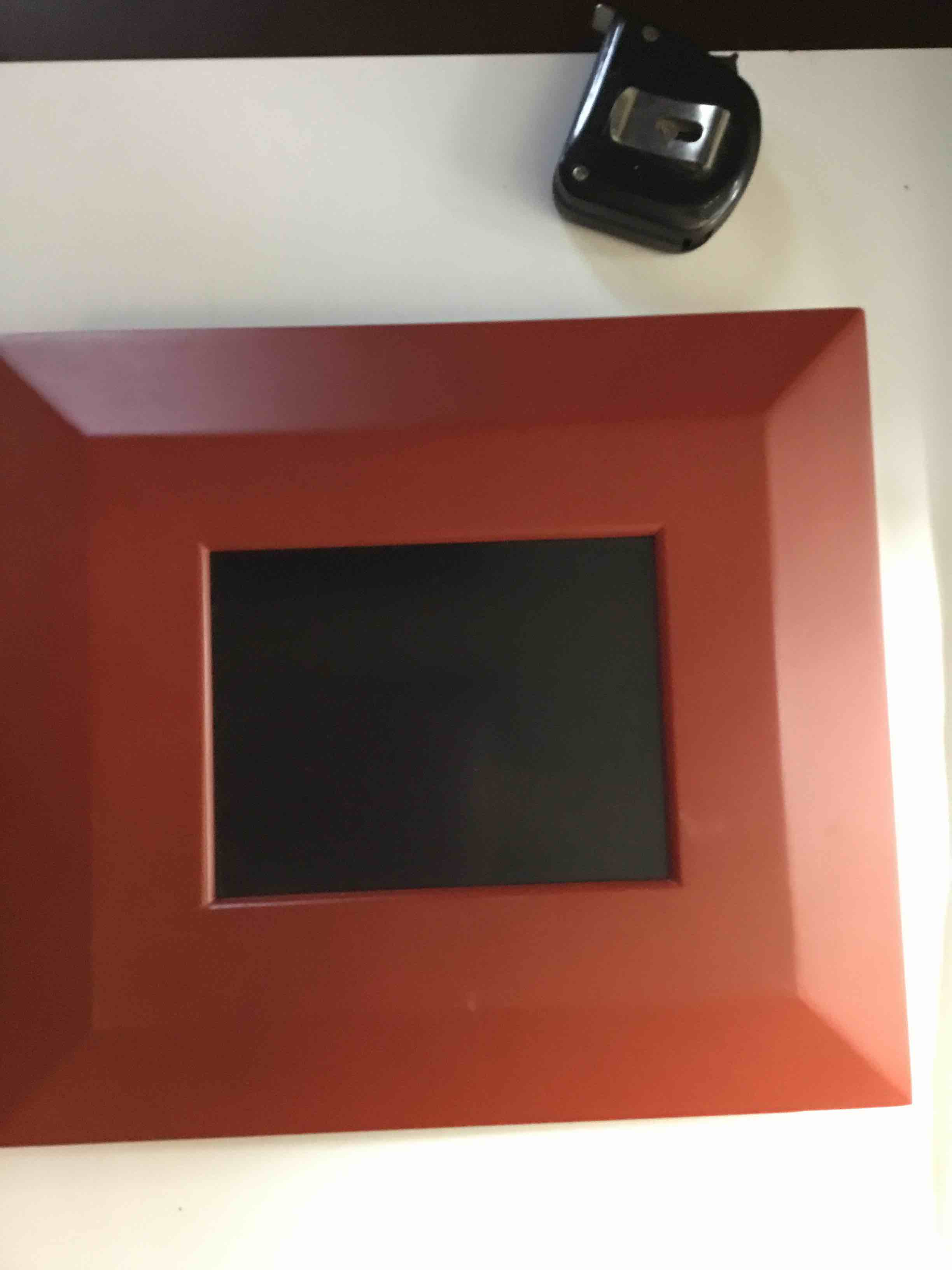 Brookstone digital photo frame.Red wood photo picture frame with a curved convex design.