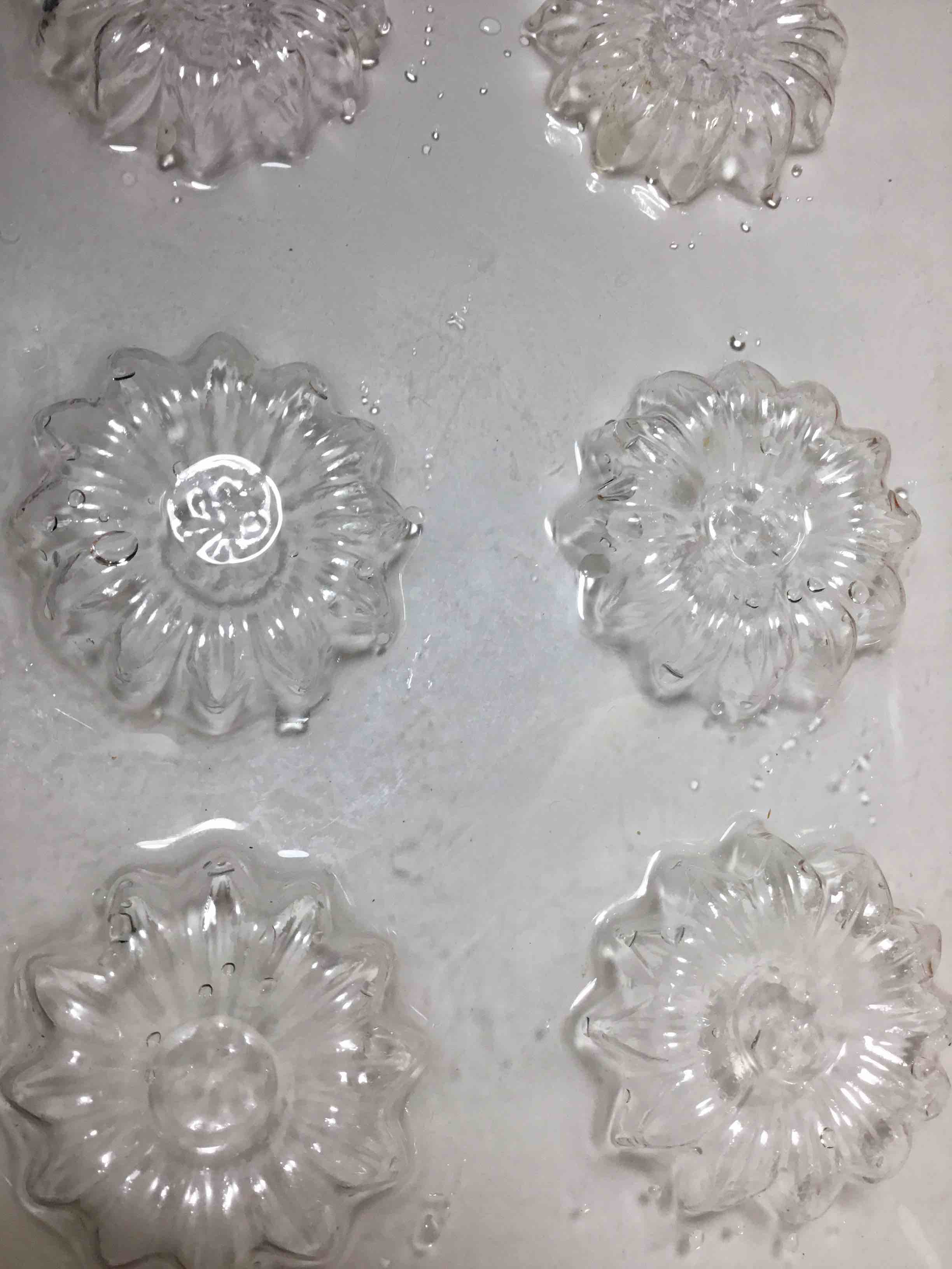 Plastic mold for making candies or chocolates