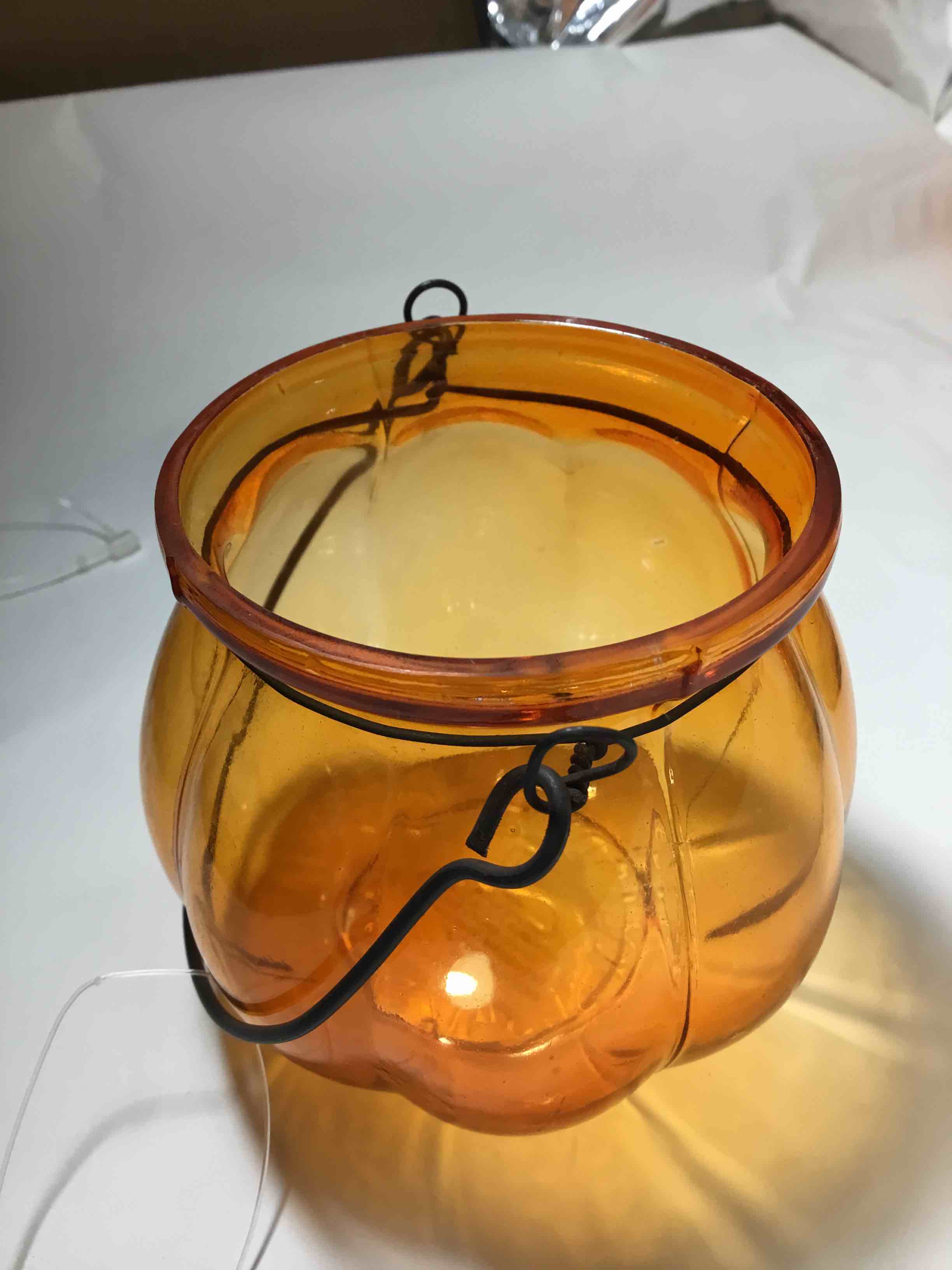 Glass, pumpkin orange tea, light holder