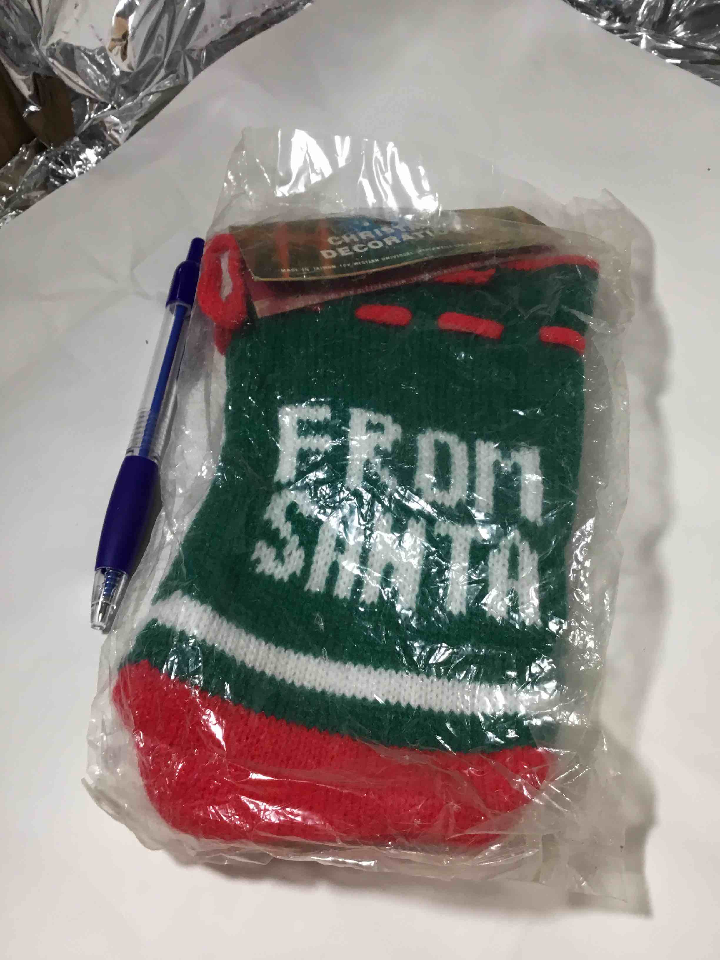 Vintage knit stocking, says from Santa
