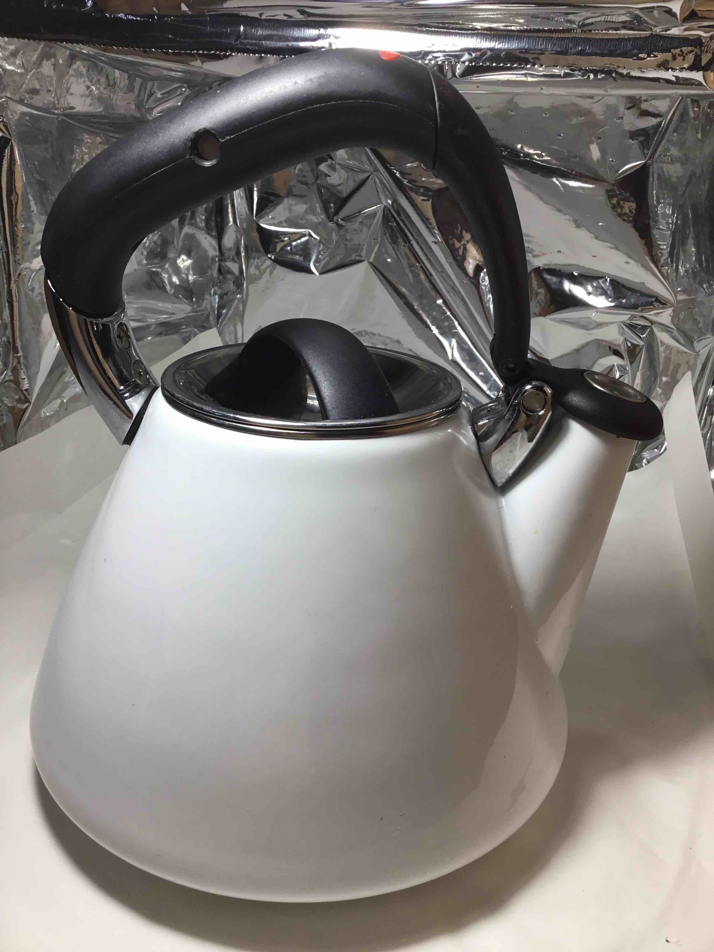White enamel-on-steel tea kettle