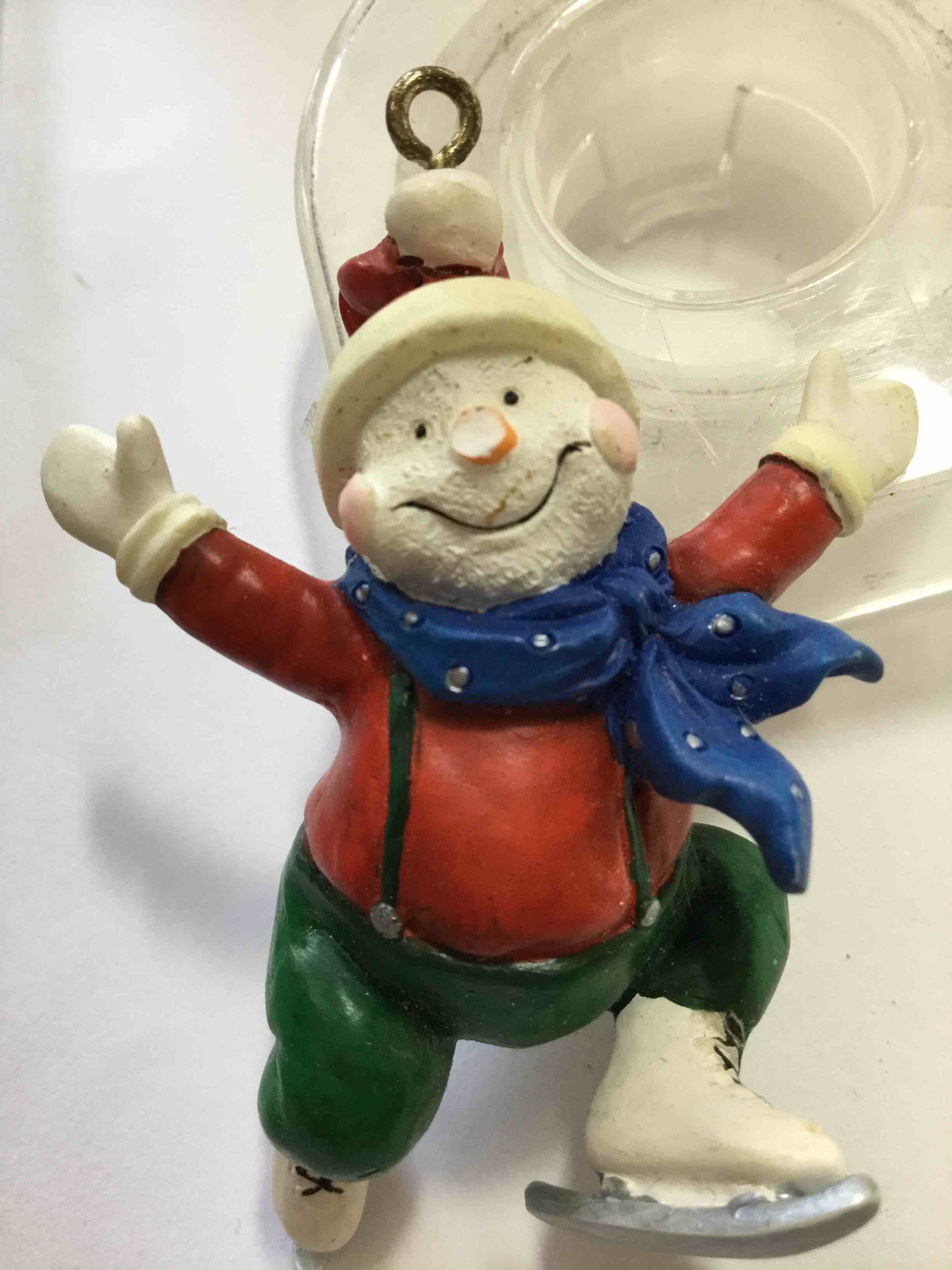 Resin snowman figurine ornament designed for Christmas or winter decor
