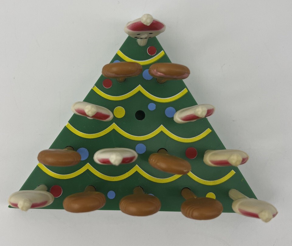 Christmas brain teaser game featuring snowman, Santa, and gingerbread characters. 