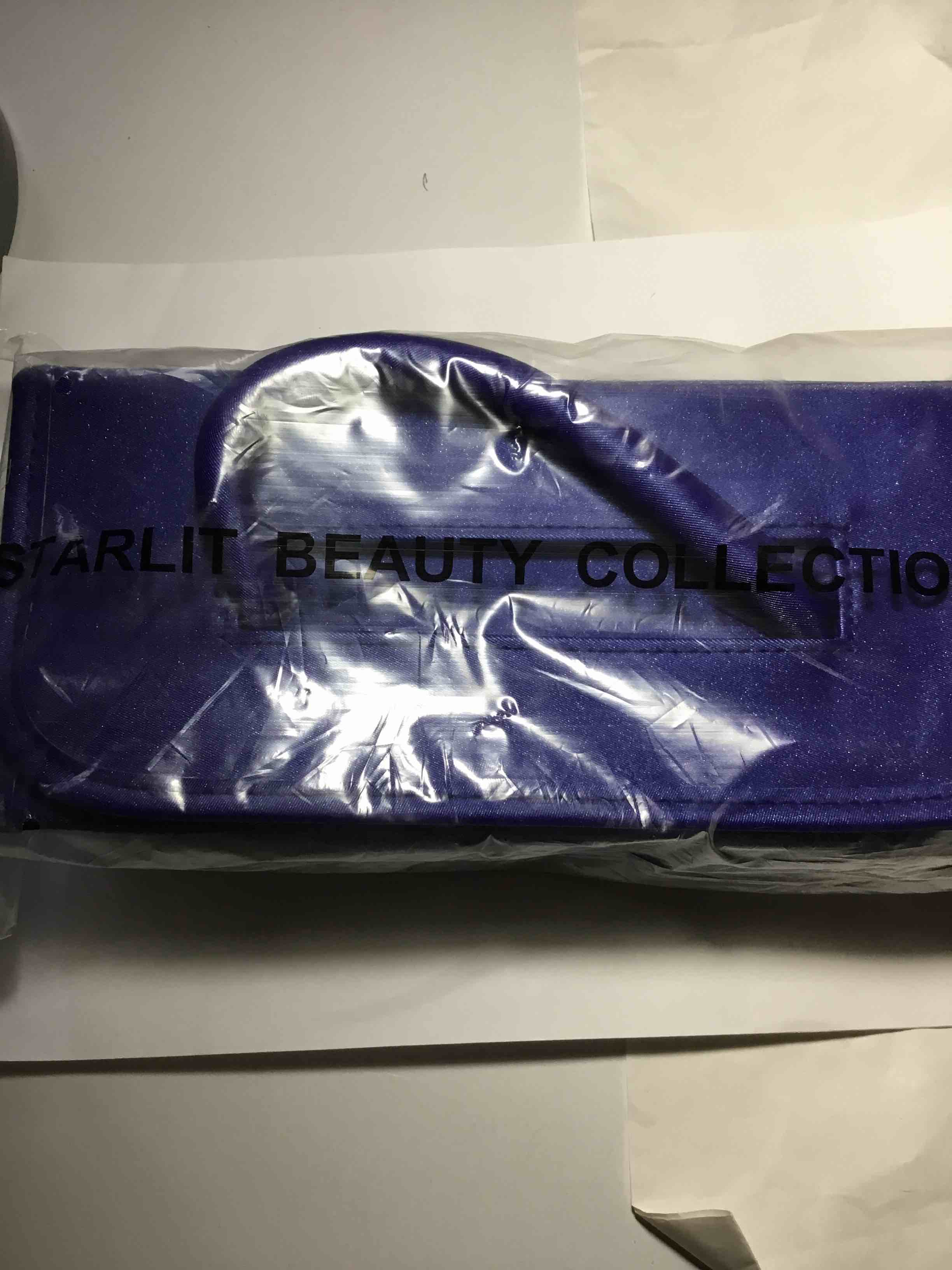 Purple cosmetic bag from the "Starlit Beauty Collection