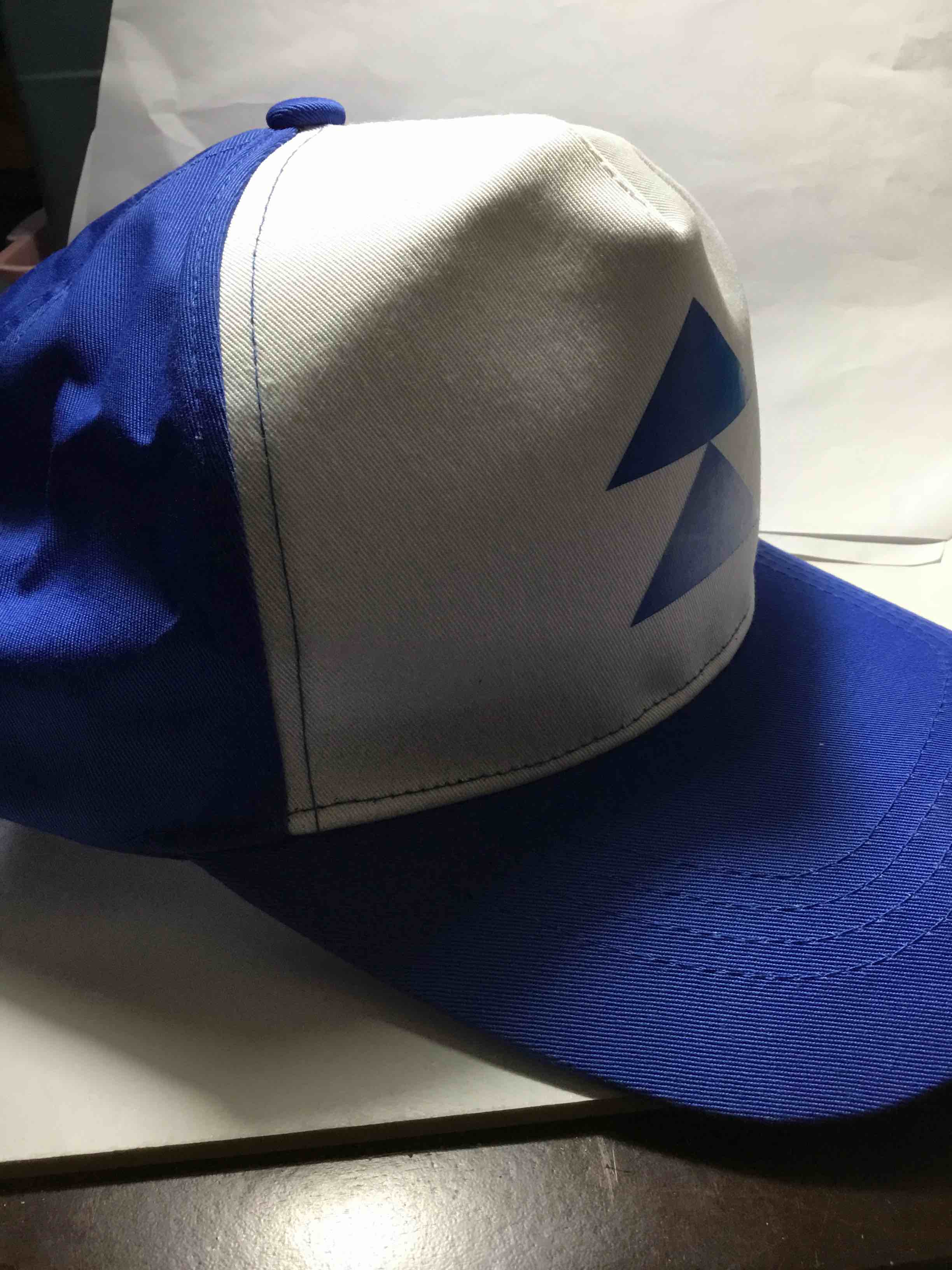 Condition photo showing Brand New for Hat that resembles a blue and white Dipper Pines' pine tree trucker hat from the TV show Gravity Falls