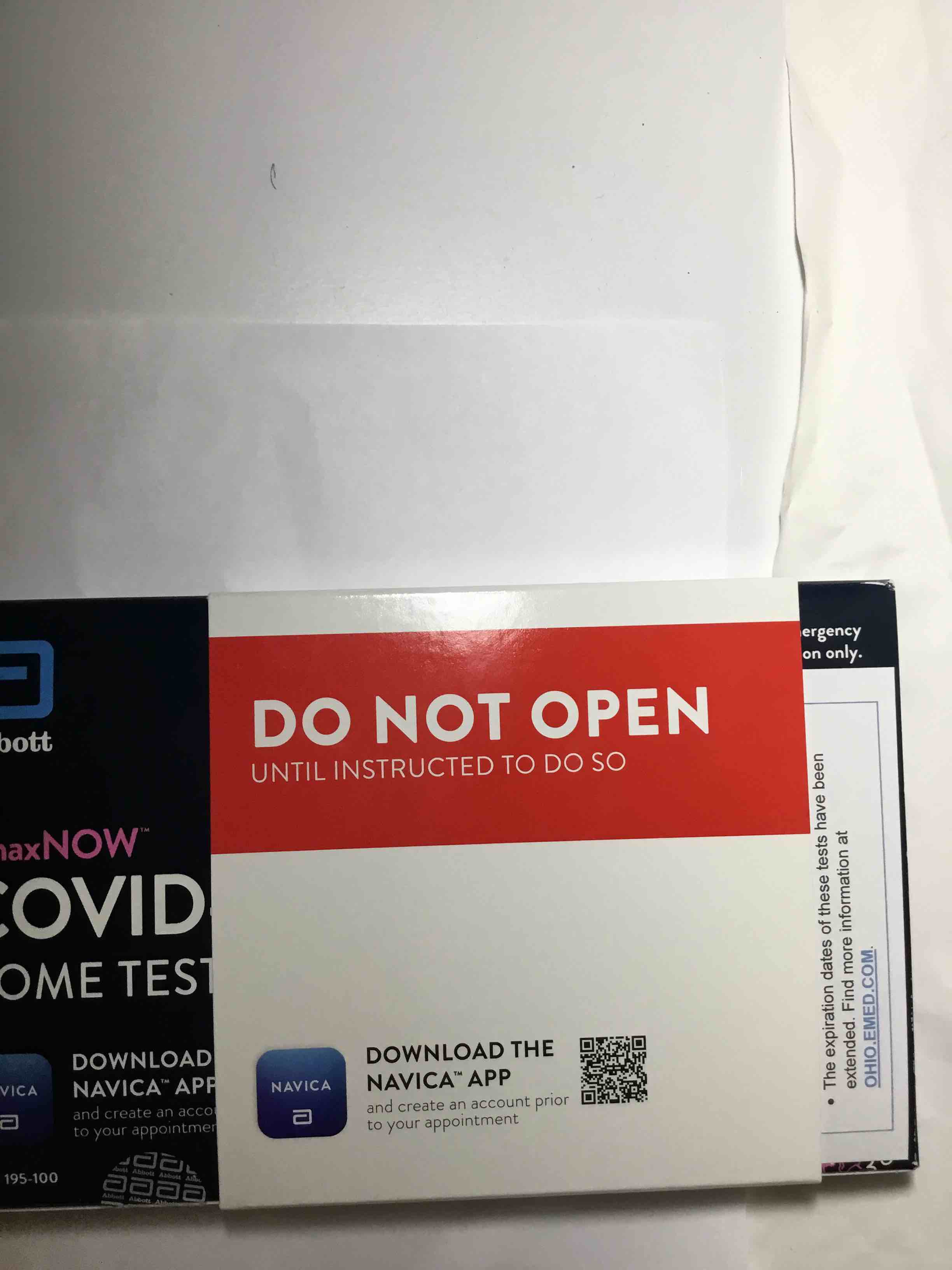 Condition photo showing As Is for Abbott brand, BinaxNOW with Covid home test