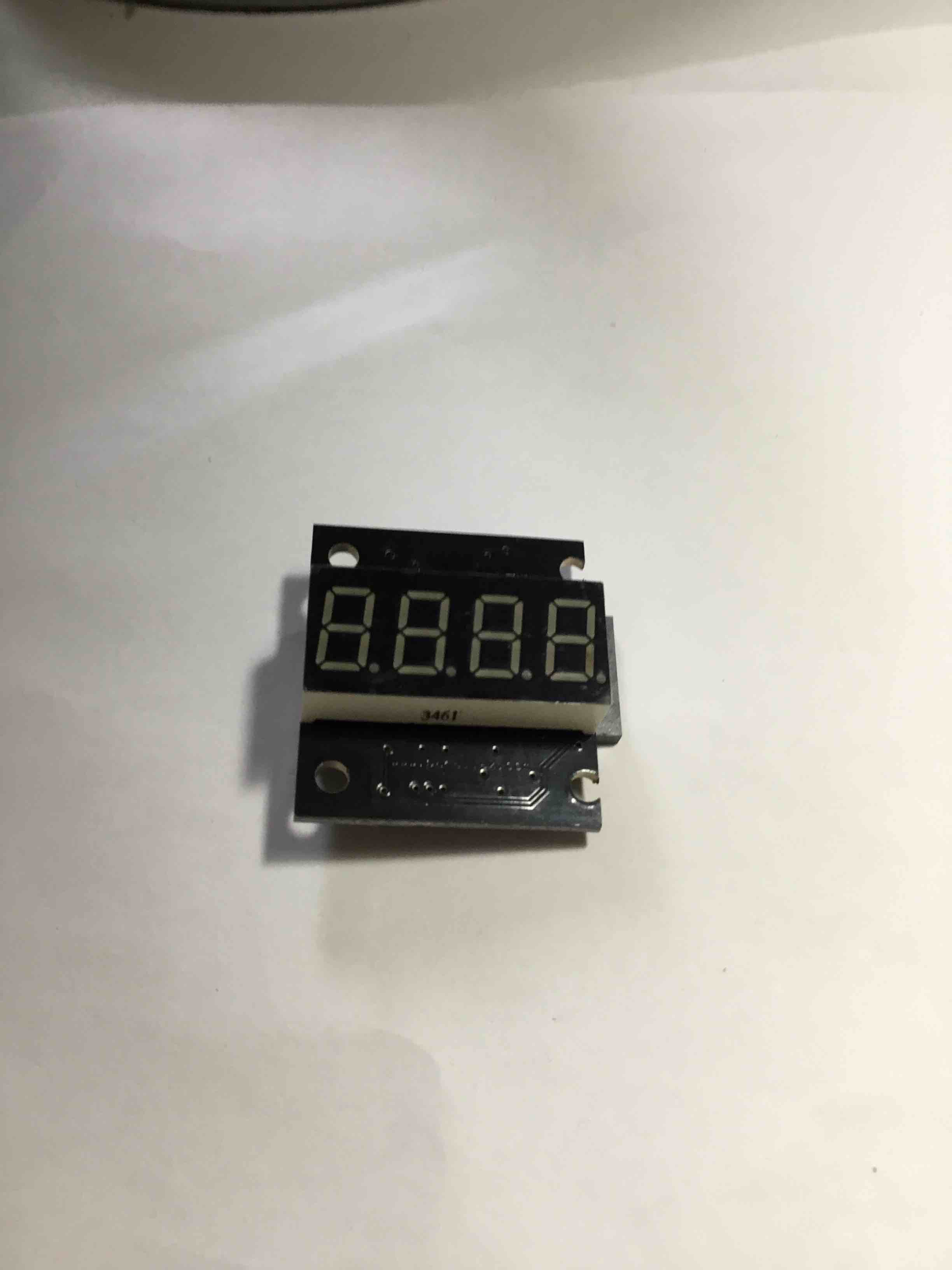 4-digit, 7-segment LED display module with a TM1637 driver chip