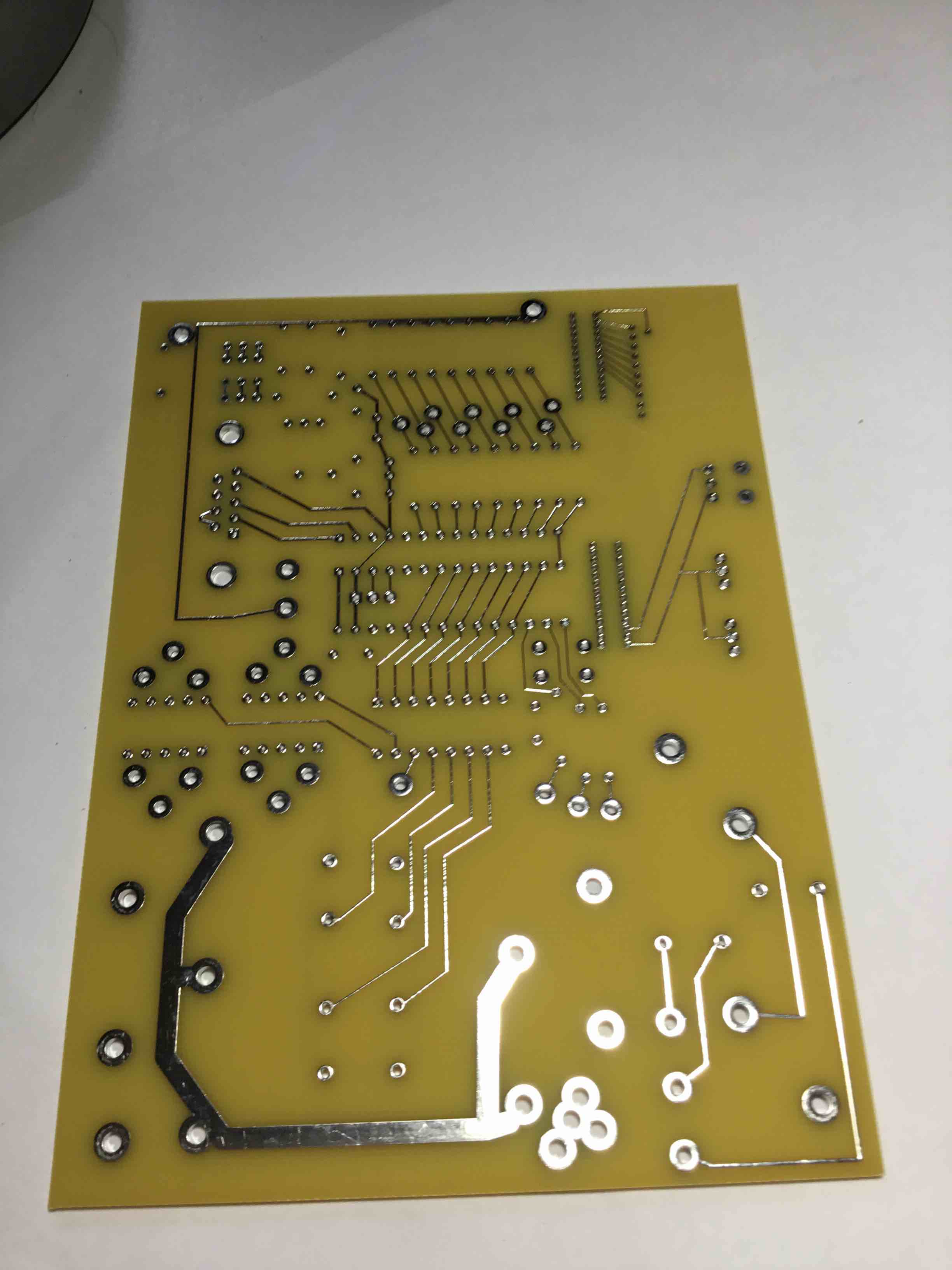 This is a bare printed circuit board (PCB).  