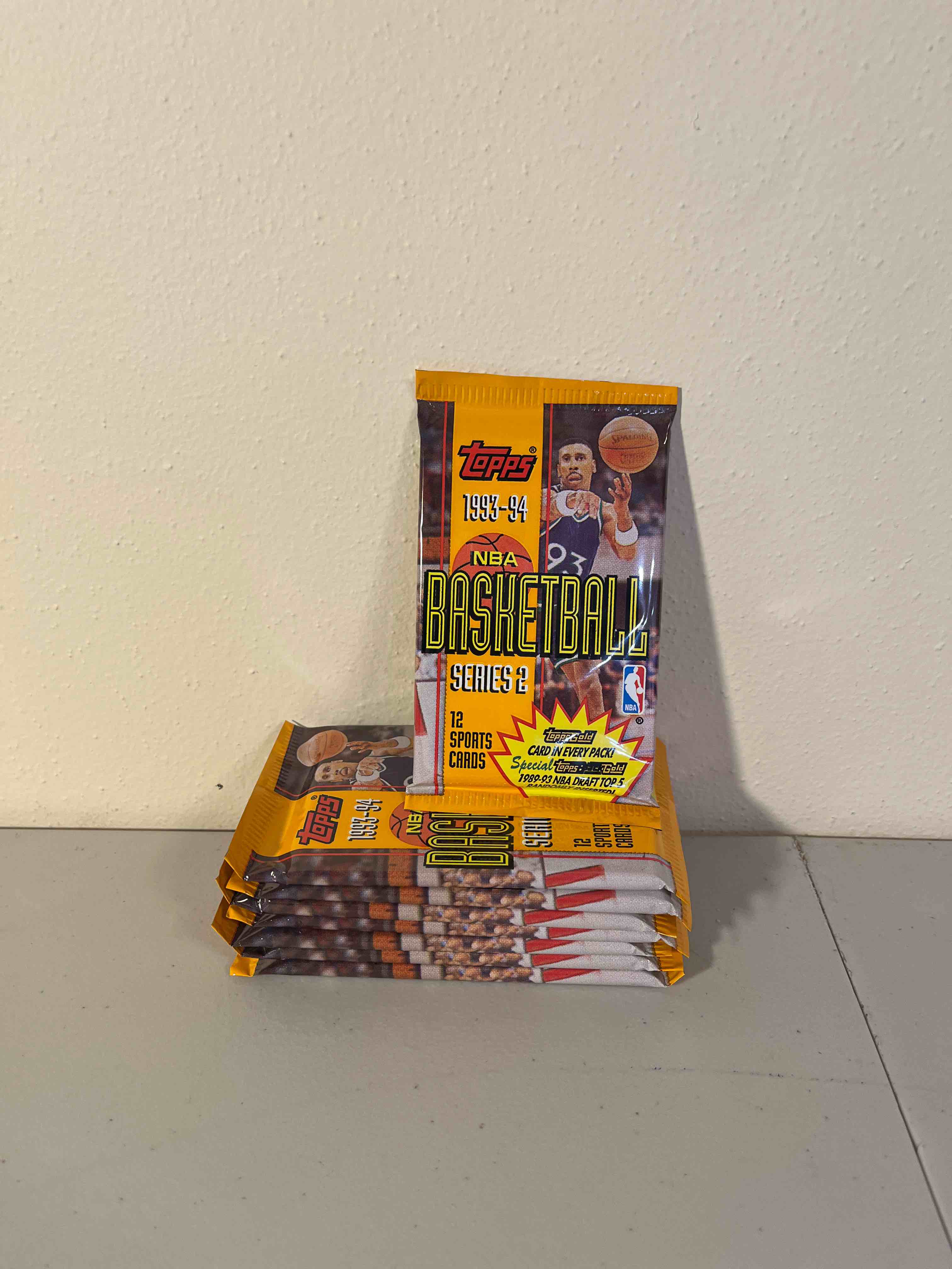 sealed packs 1993-94 topps basketball cards- 8 sealed packs- look for topps gold and black gold! penny hardaway and chris webber rookie year!