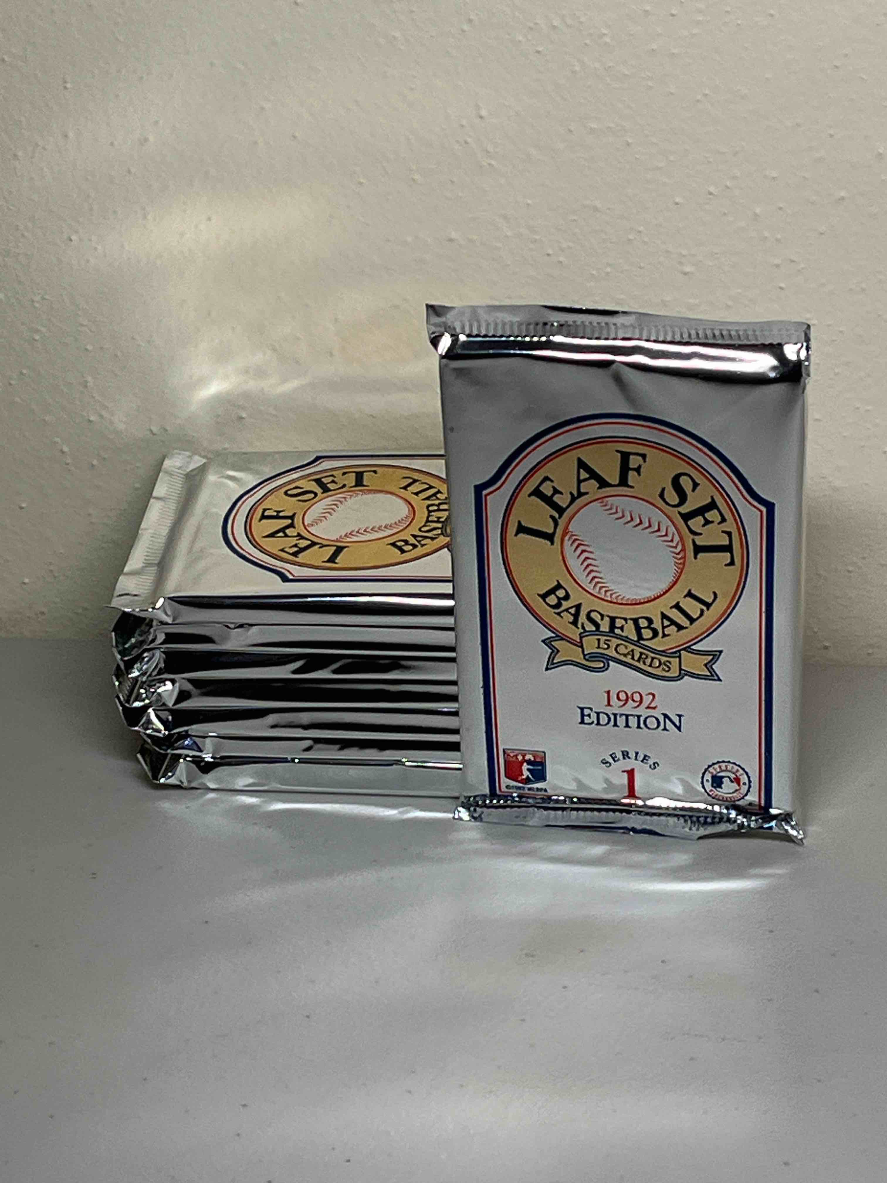 (8) sealed packs 1992 leaf baseball cards- leaf gold edition in every pack!! 