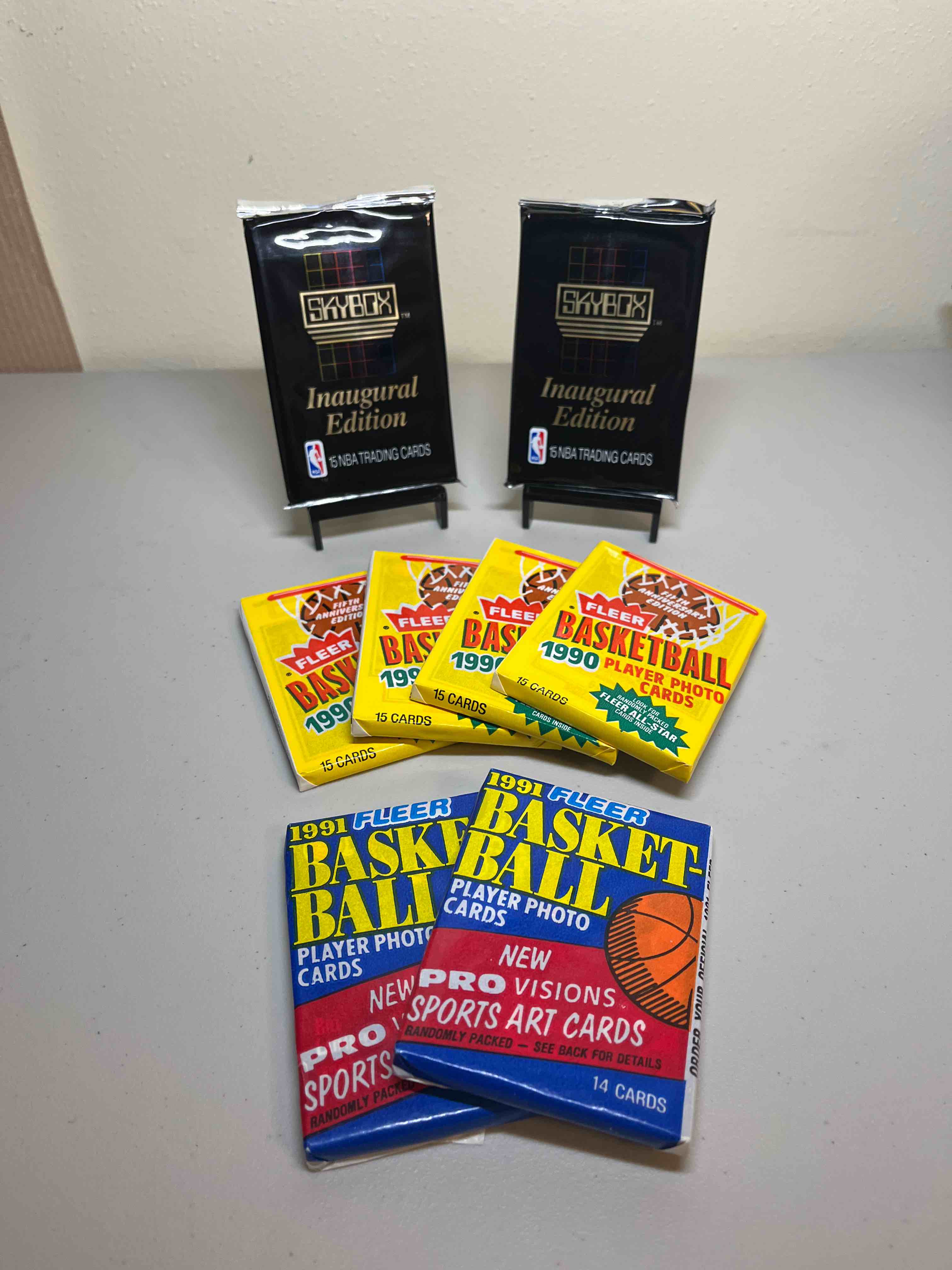 (8) Assorted 1990’s NBA Basketball Card Packs- Sealed Packs! Skybox Inaugural Edition! Fleer! Look for Randomly Inserted Pro-Visions Art Cards! Possible Michael Jordan!