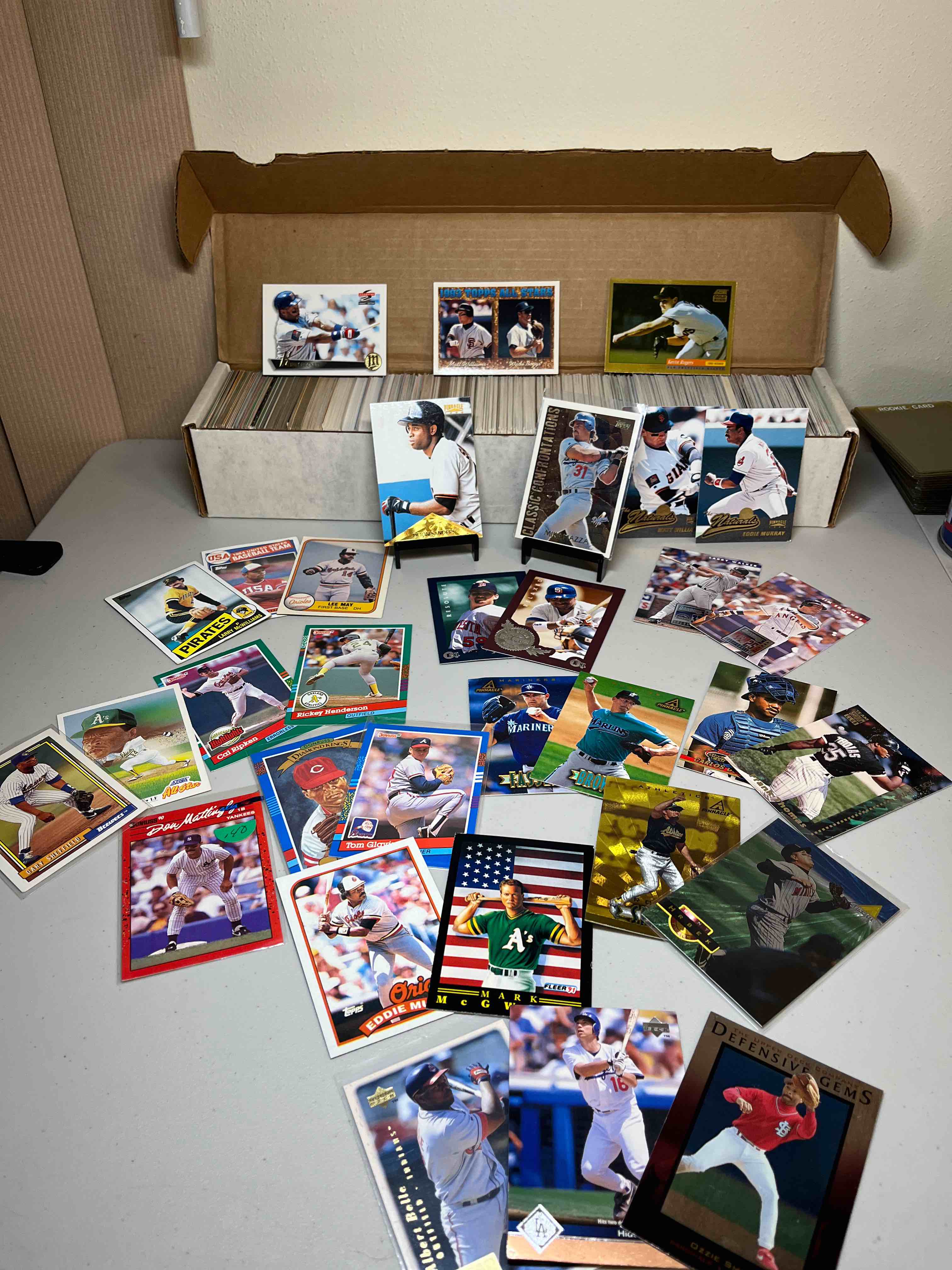 Huge 900+ count box of Mixed 80’s & 90’s Baseball Cards- So many different years and sets! Fleer, Ultra, Topps, Pinnacle, Score, and Upper Deck! Rare Inserts and Beautiful Parallels! Check these out!
