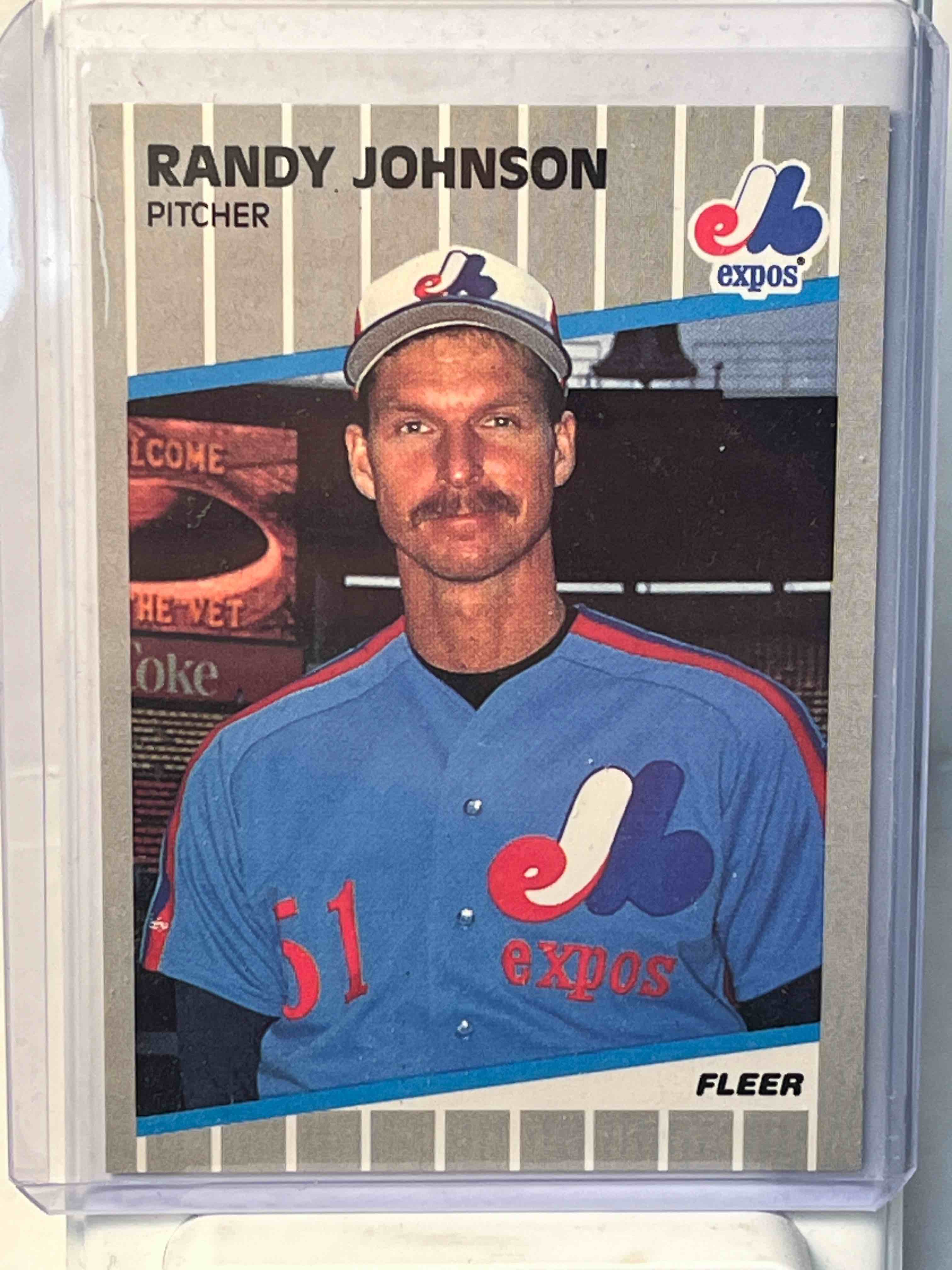 1986 Fleer Baseball Randy Johnson Rookie Card #381- MLB Montreal Expos / Seattle Mariners- Toploaded. Coke Sign In Background. Pack Fresh Condition!!