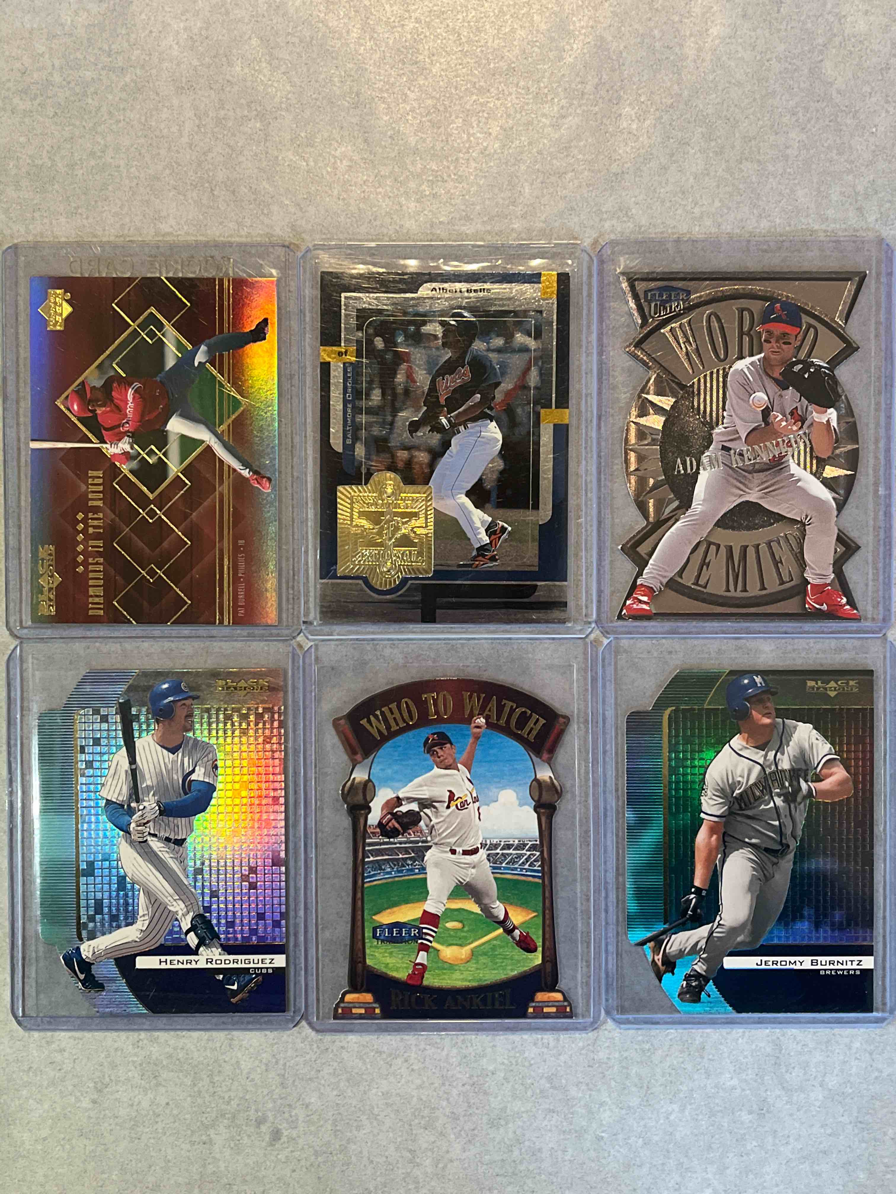 (6) Card lot 90’s & 00’s Baseball Cards- Stars, Rookie Inserts & Die-cut Cards! Fleer World Premiere & Upper Deck Black Diamond Die-cuts! Albert Belle, Jeremy Burnitz & more!!