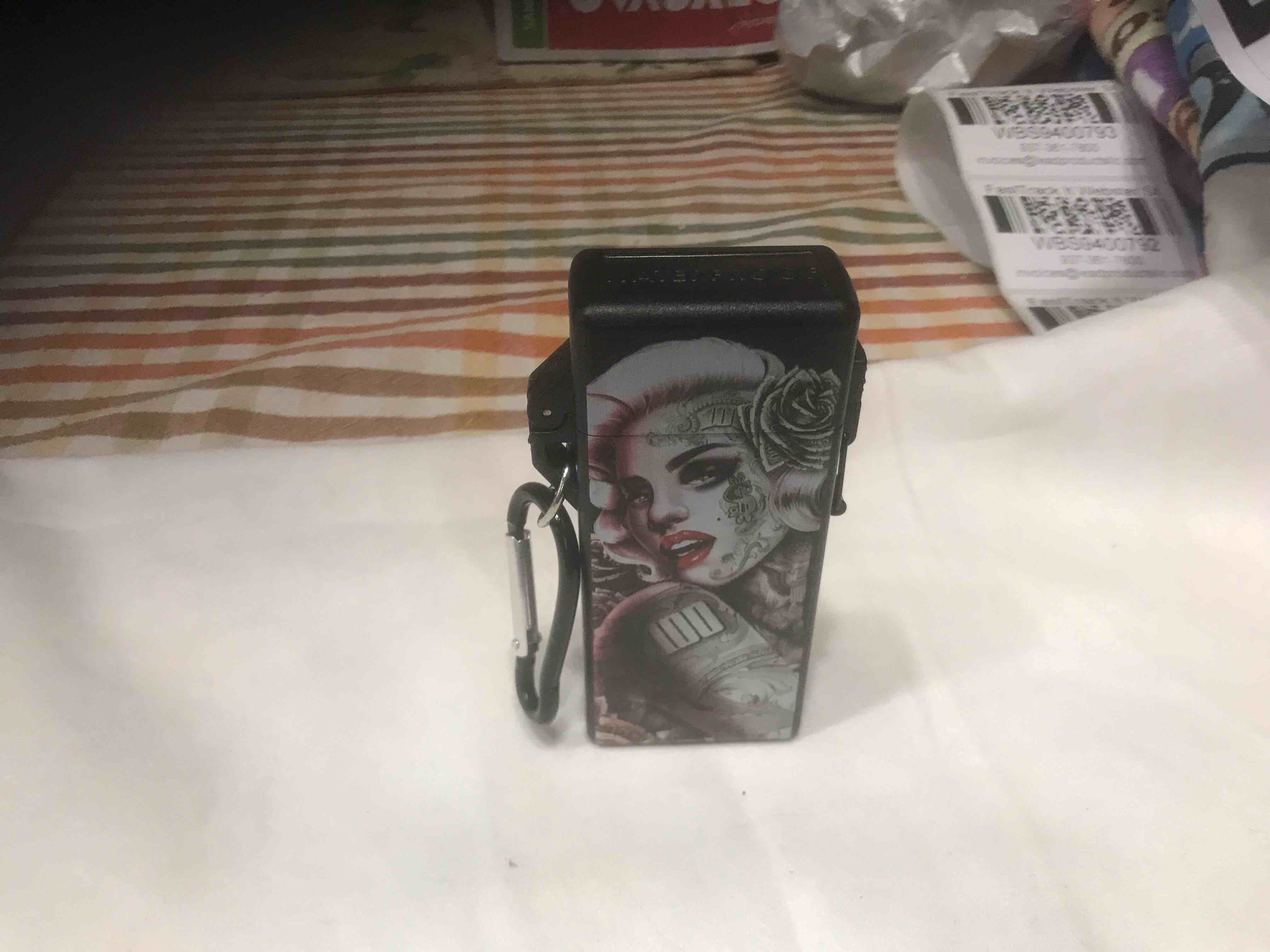 Condition photo showing New/Like New for Bic  lighter holder