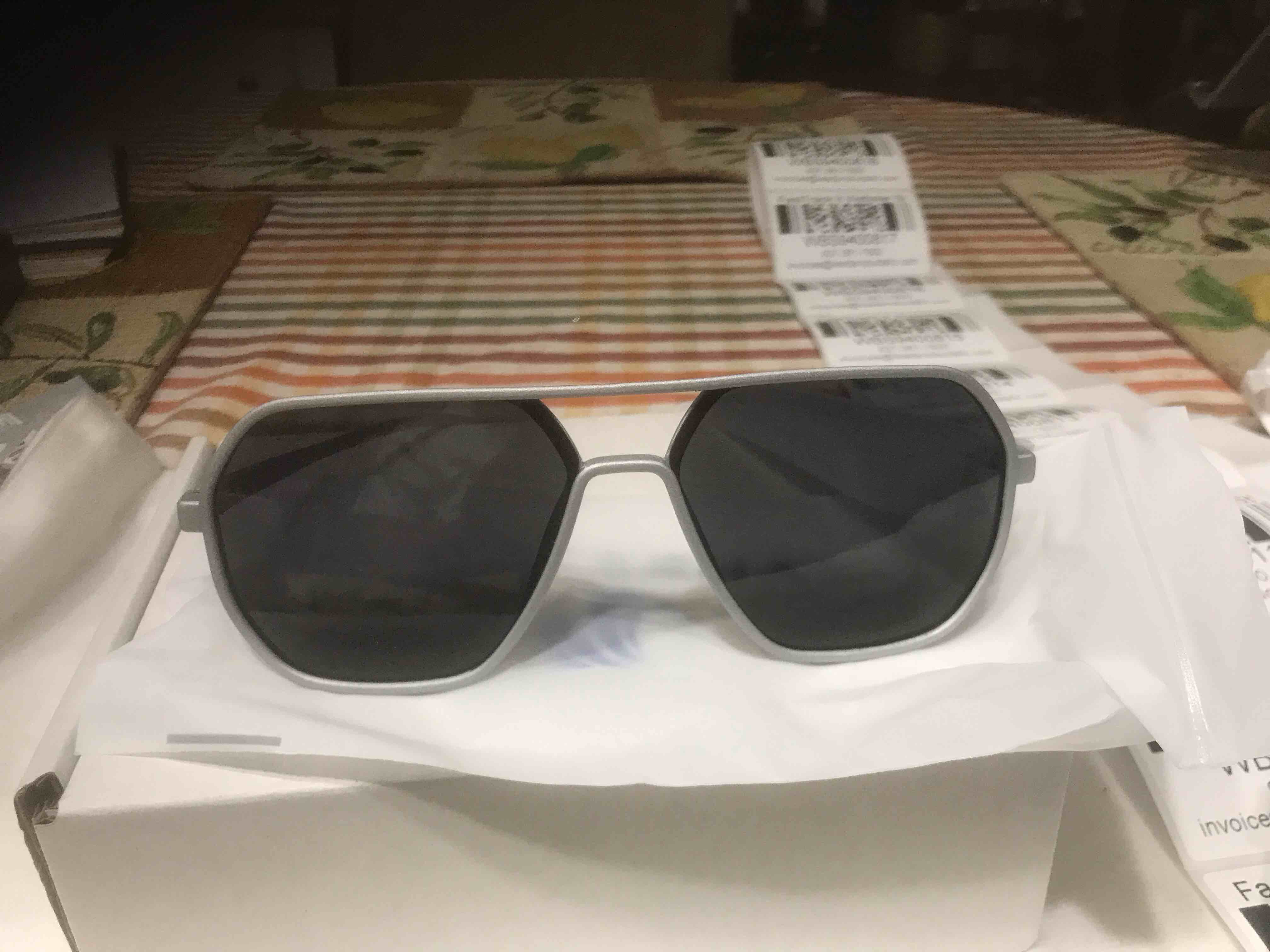 Condition photo showing New/Like New for Sunglasses