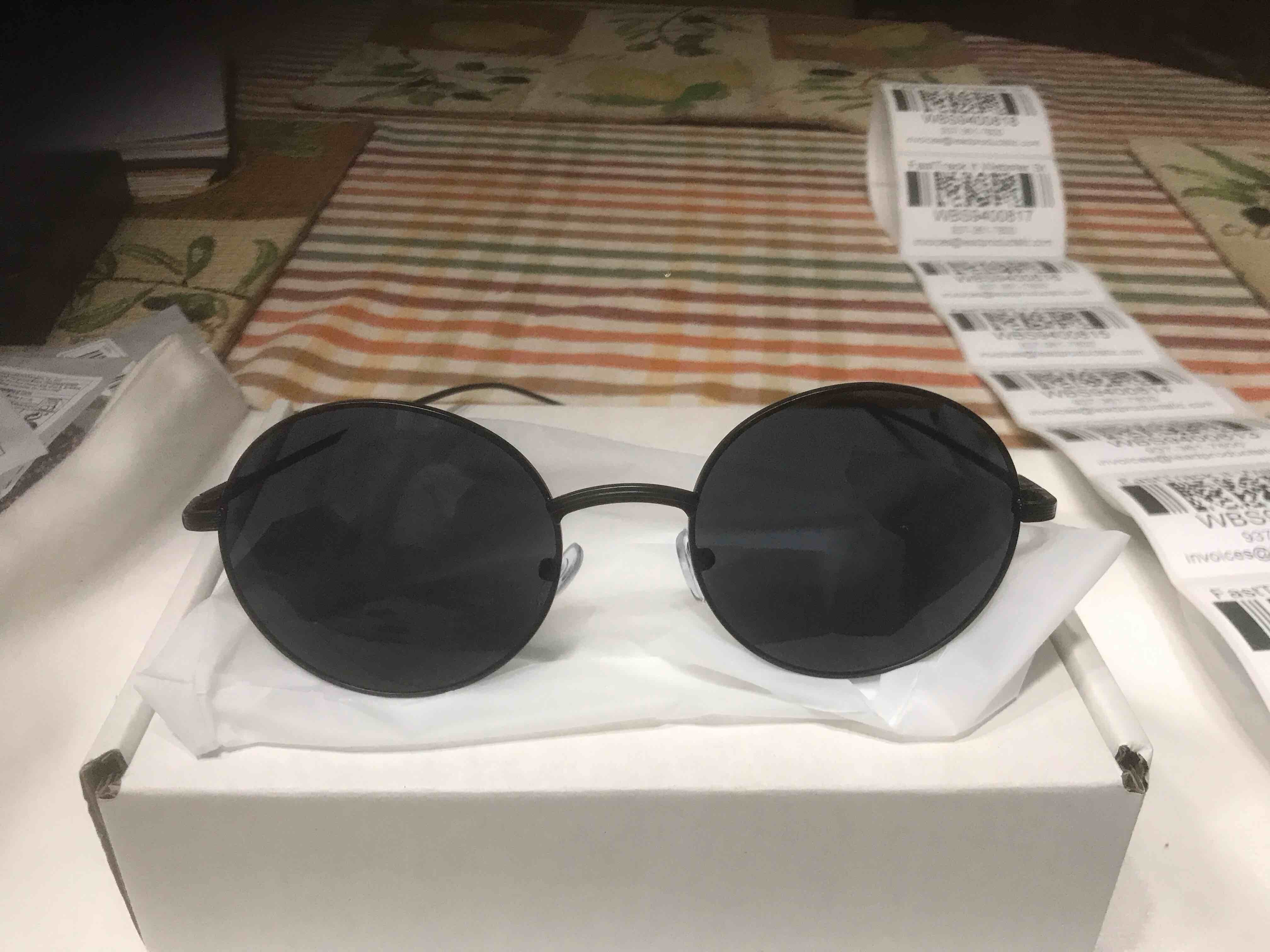 Condition photo showing New/Like New for Sunglasses