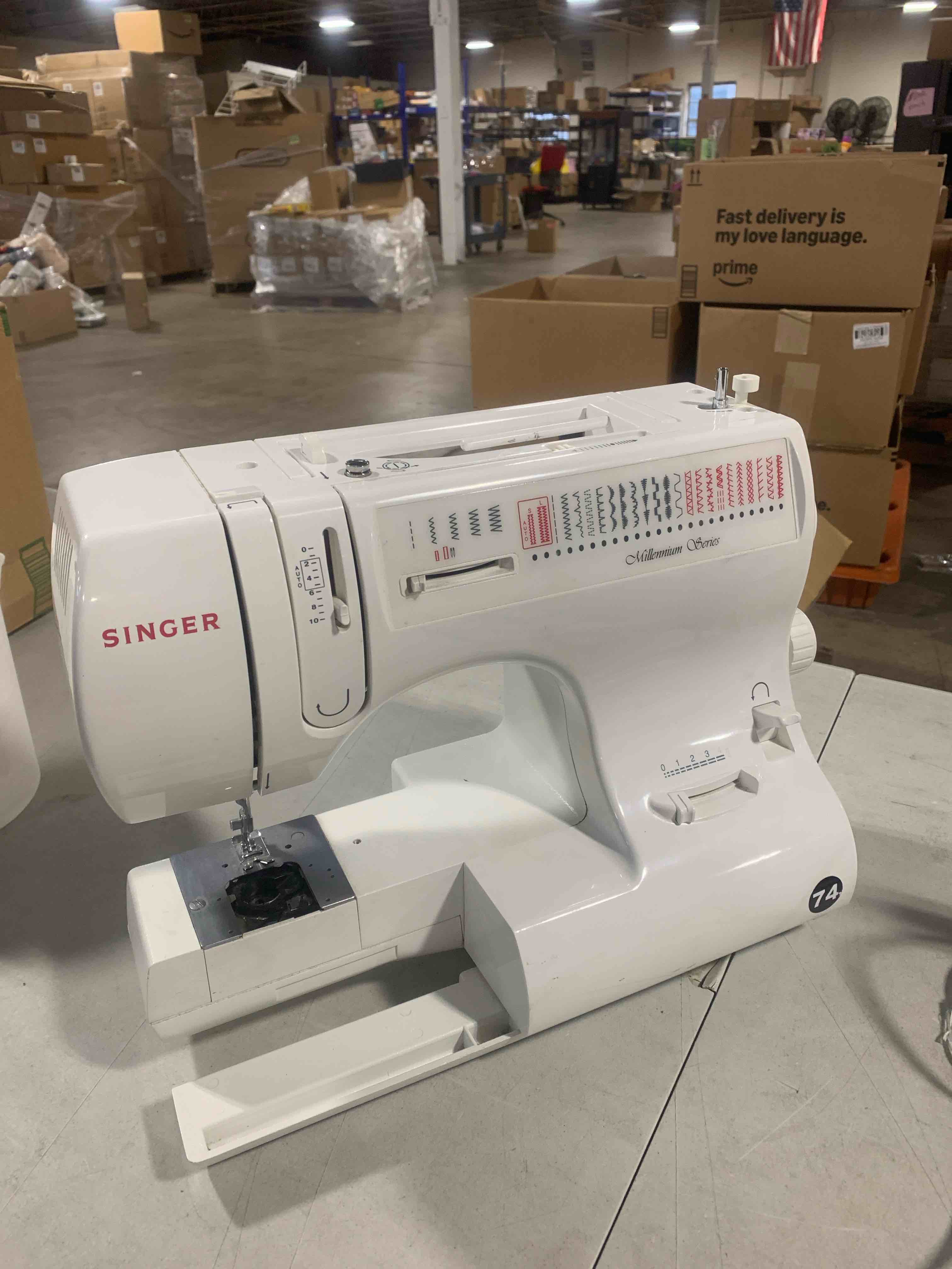 Singer Millennium series sewing machine with pedal, *no case*