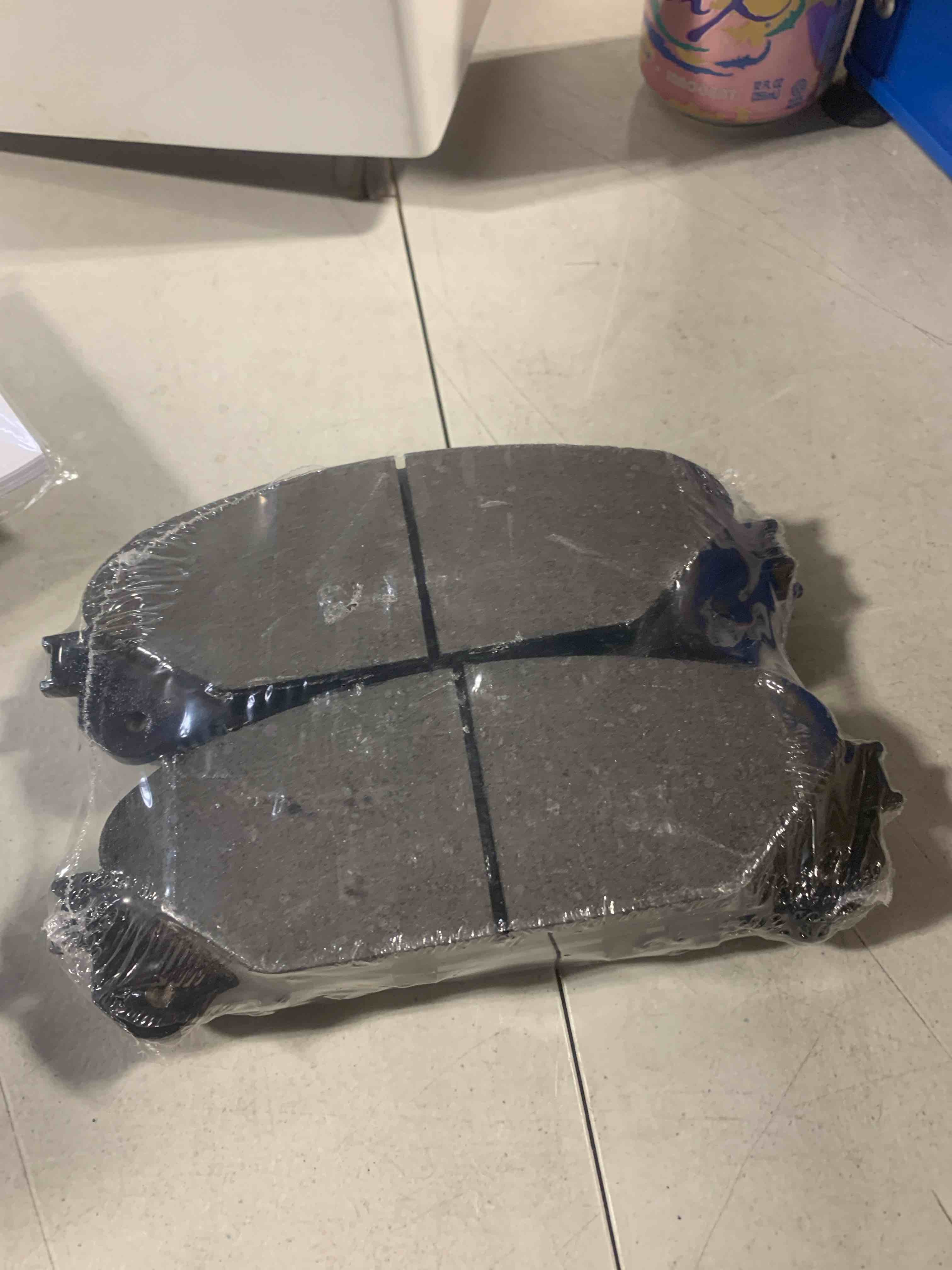 Condition photo showing New/Like New for 4 pieces brake pads 