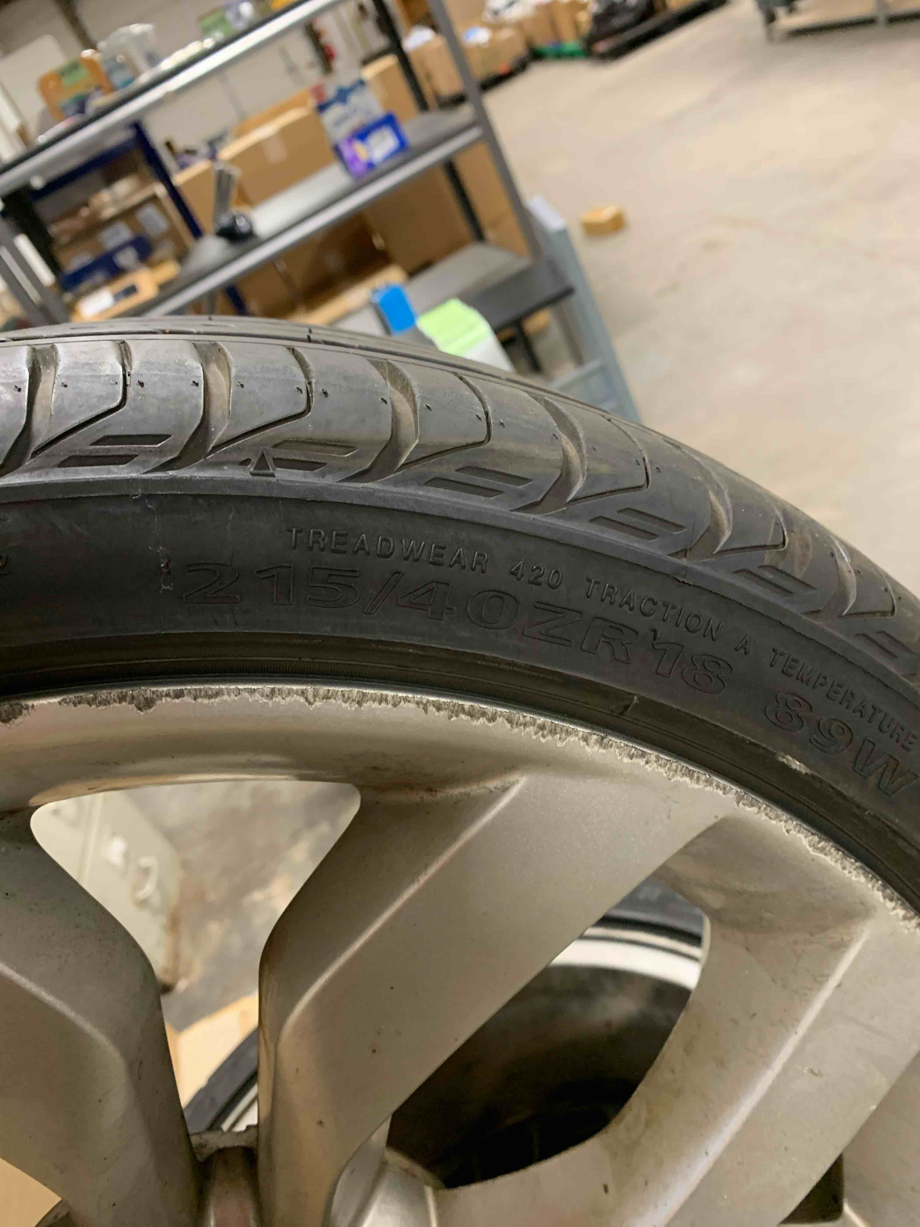Condition photo showing Good Condition for 215/40RZ18 Tires and Rims 