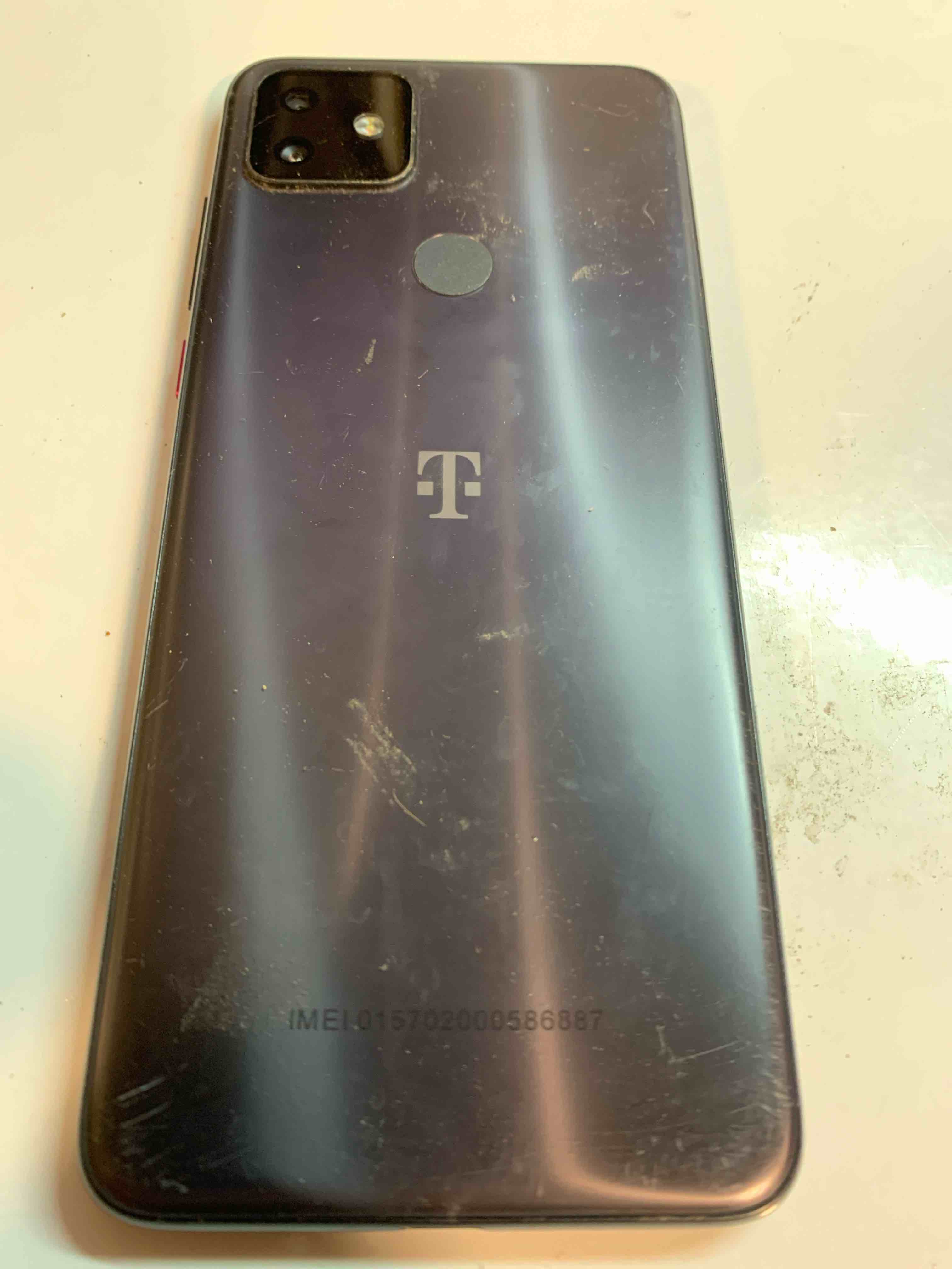 Condition photo showing As Is for T-Mobile Revvl 4+ Plus 5062Z 