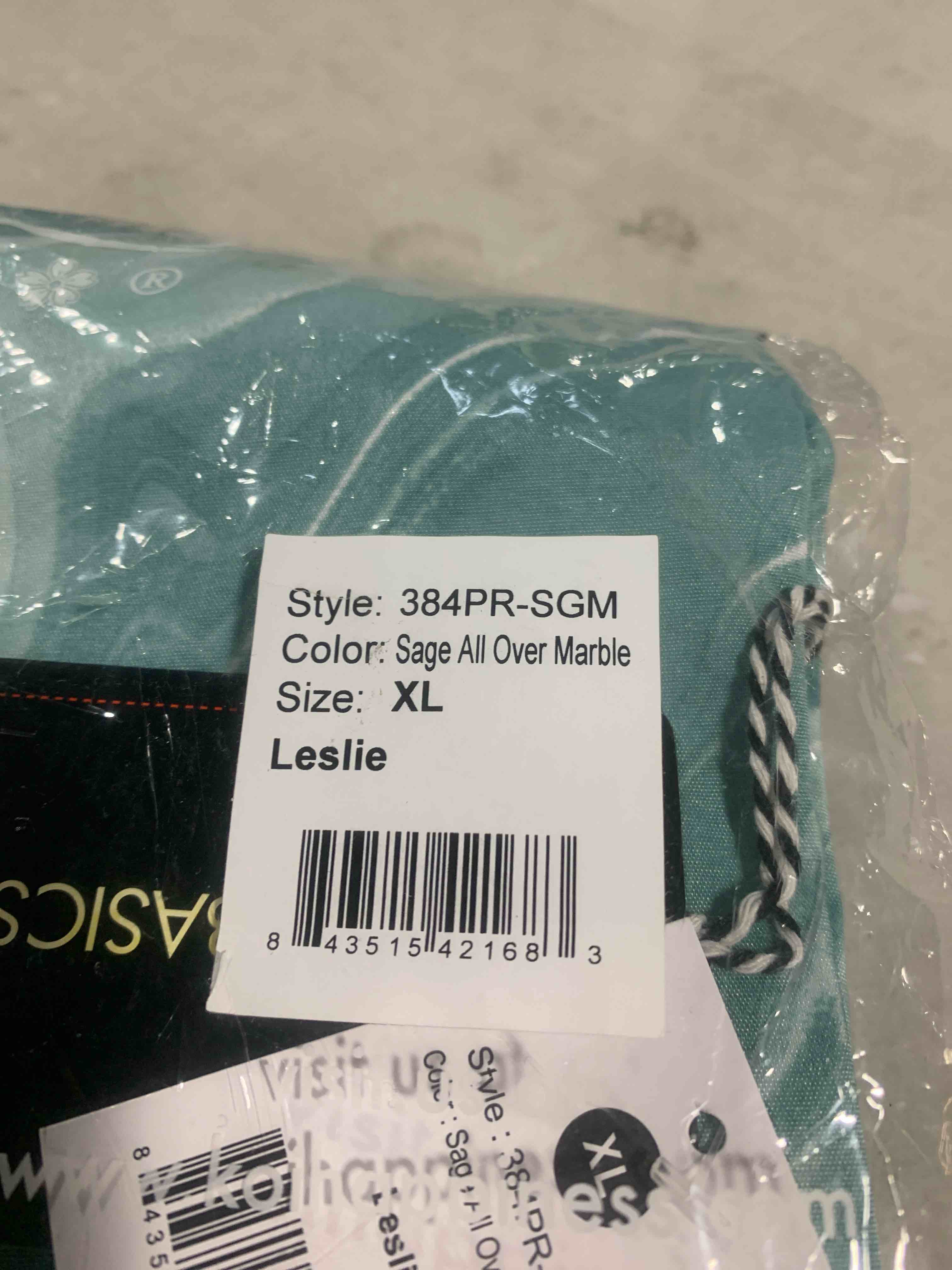 Condition photo showing New/Like New for Size X-Large koi Basics Leslie Women's 2-Pocket Stretch Print Top Sage All Over Marble