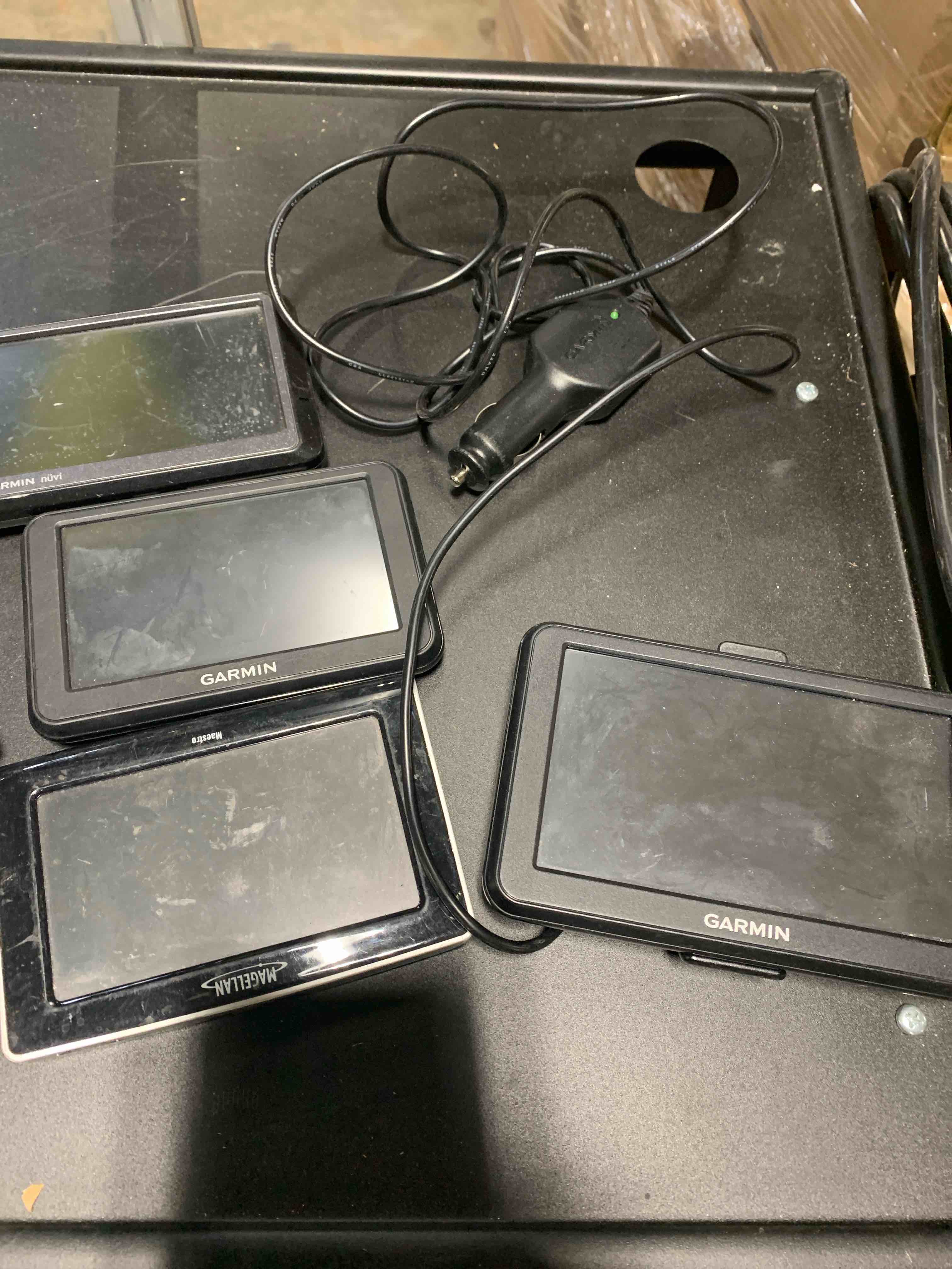 Condition photo showing Good Condition for Lot of 5 GPS devices  