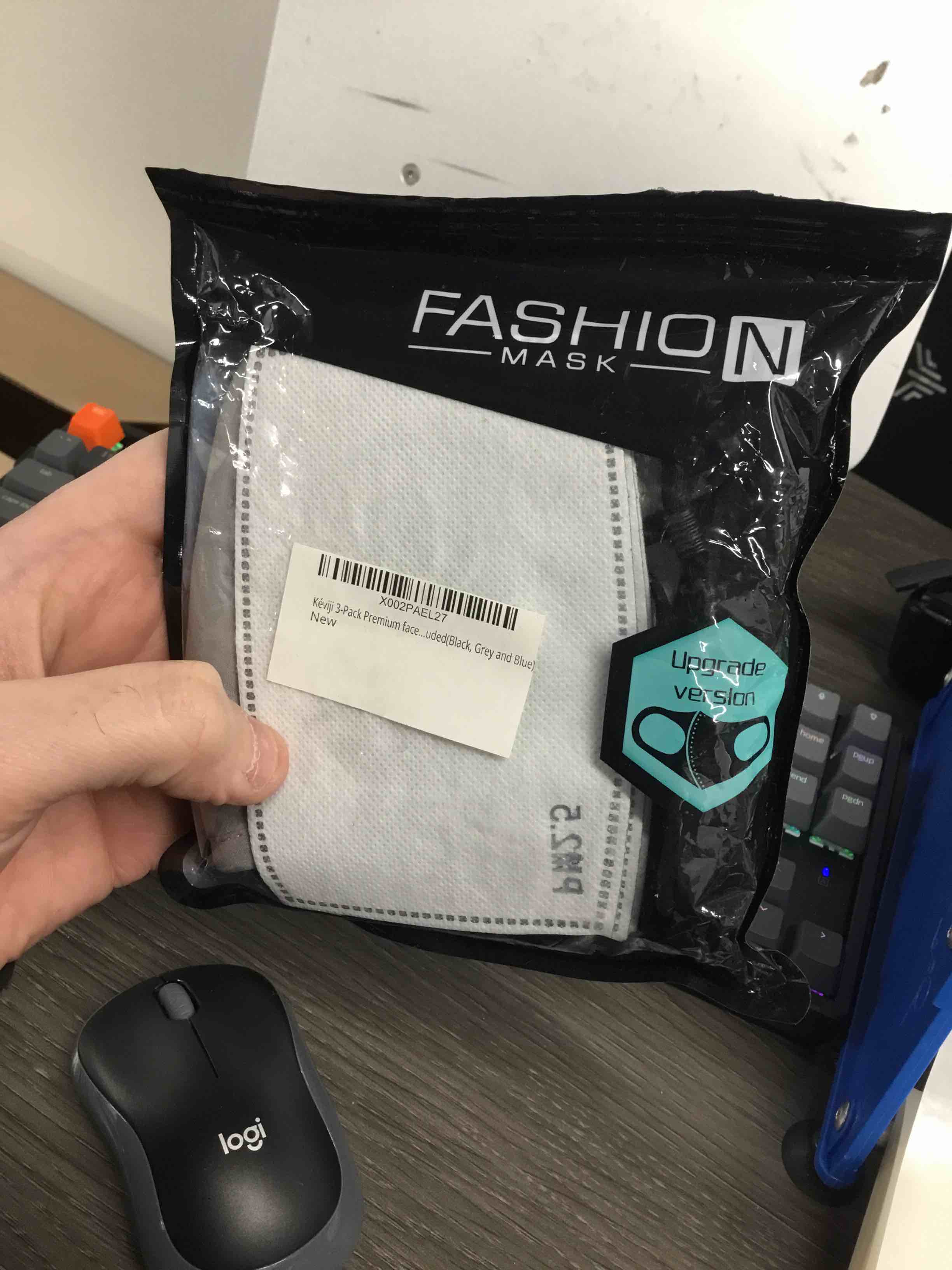 one black cloth face covering washable reusable pollution dust