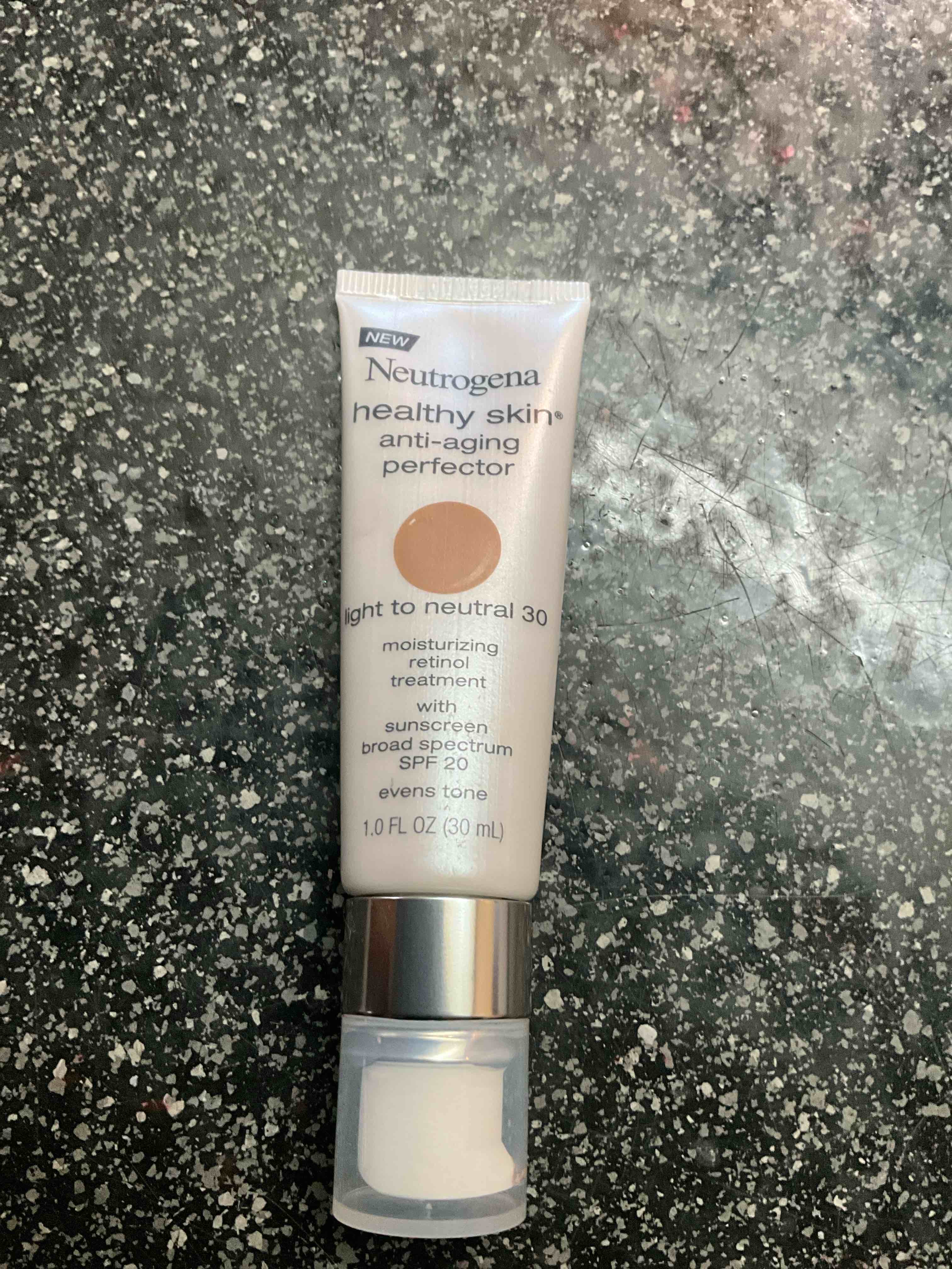 Neutrogena Healthy Skin Anti-Aging Perfector Tinted Facial Moisturizer and Retinol Treatment with Broad Spectrum SPF 20 Sunscreen with Titanium Dioxide, 30 Light to Neutral, 1 fl. oz