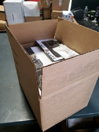 Box of Assorted Phone Cases and Screen Protectors