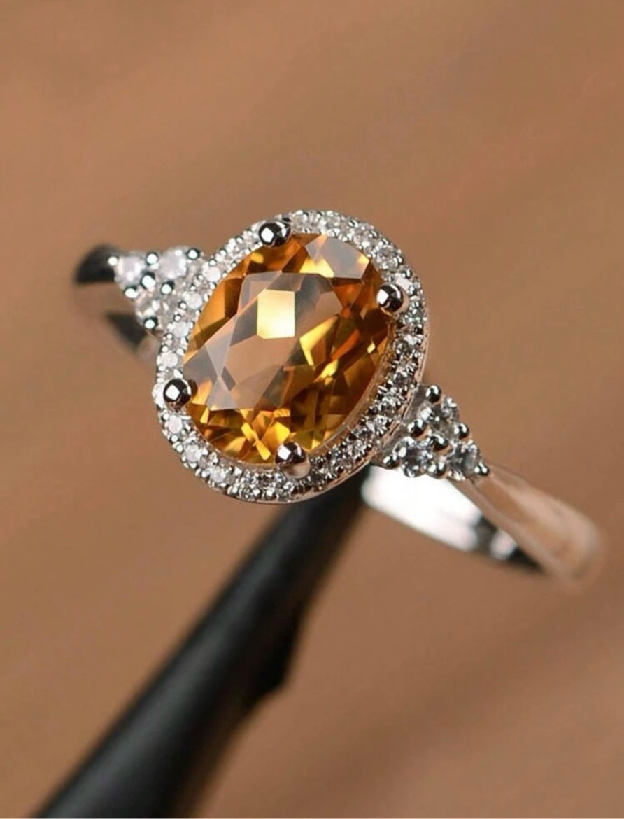 Oval halo cut topaz ring in silver setting (Size 8)