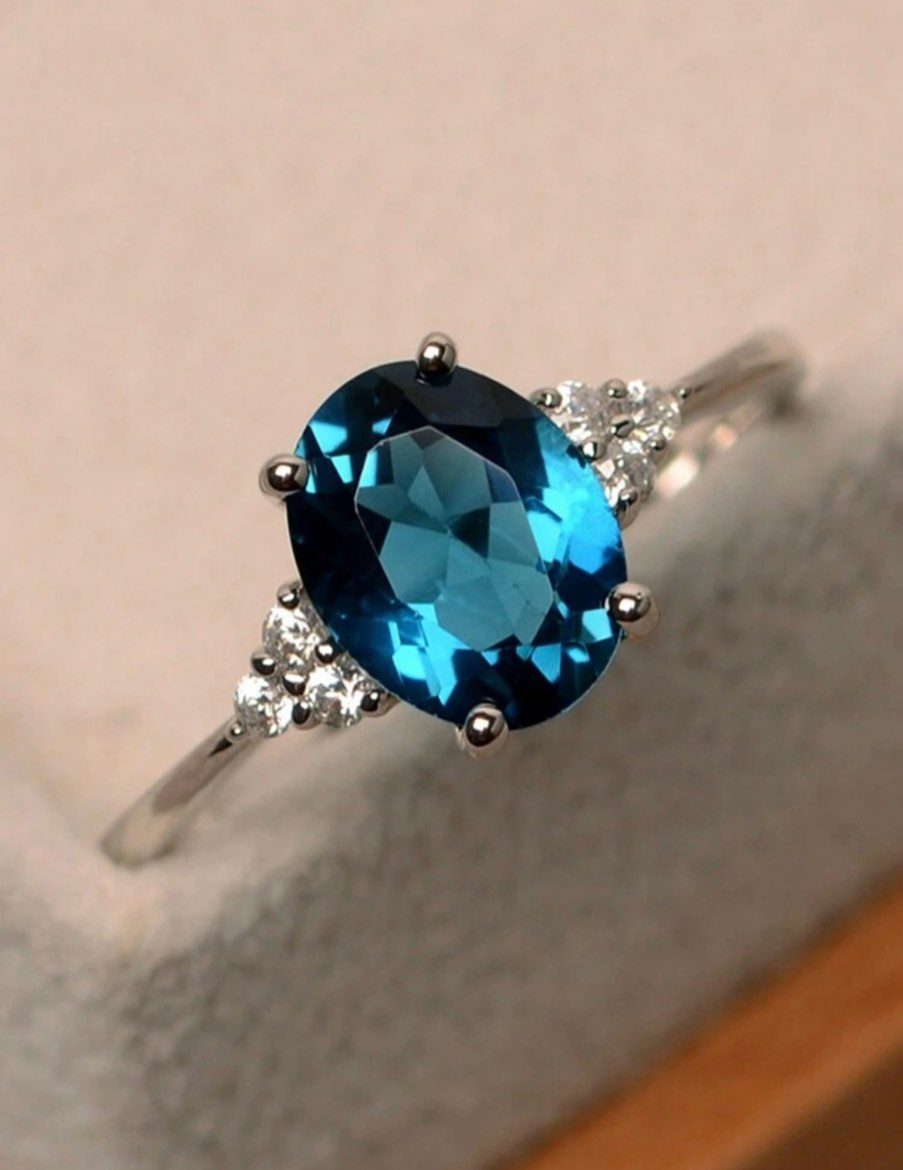 Blue topez ring in silver setting (size 8)