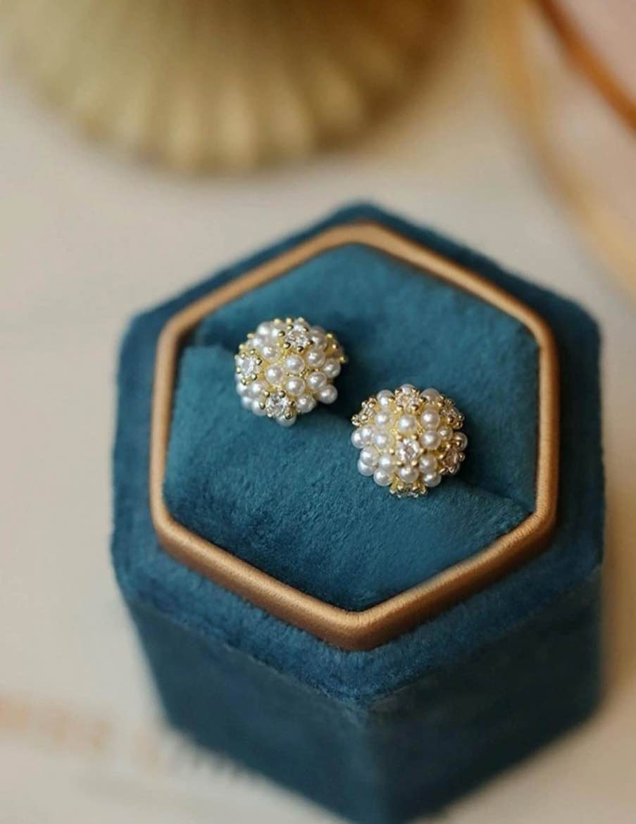 Gold and pearl stud earrings