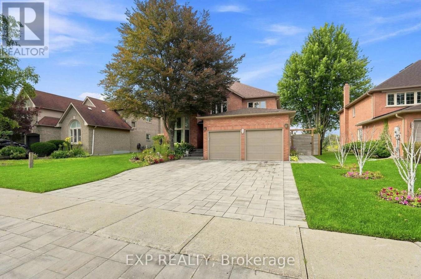 Front elevation and stone driveway