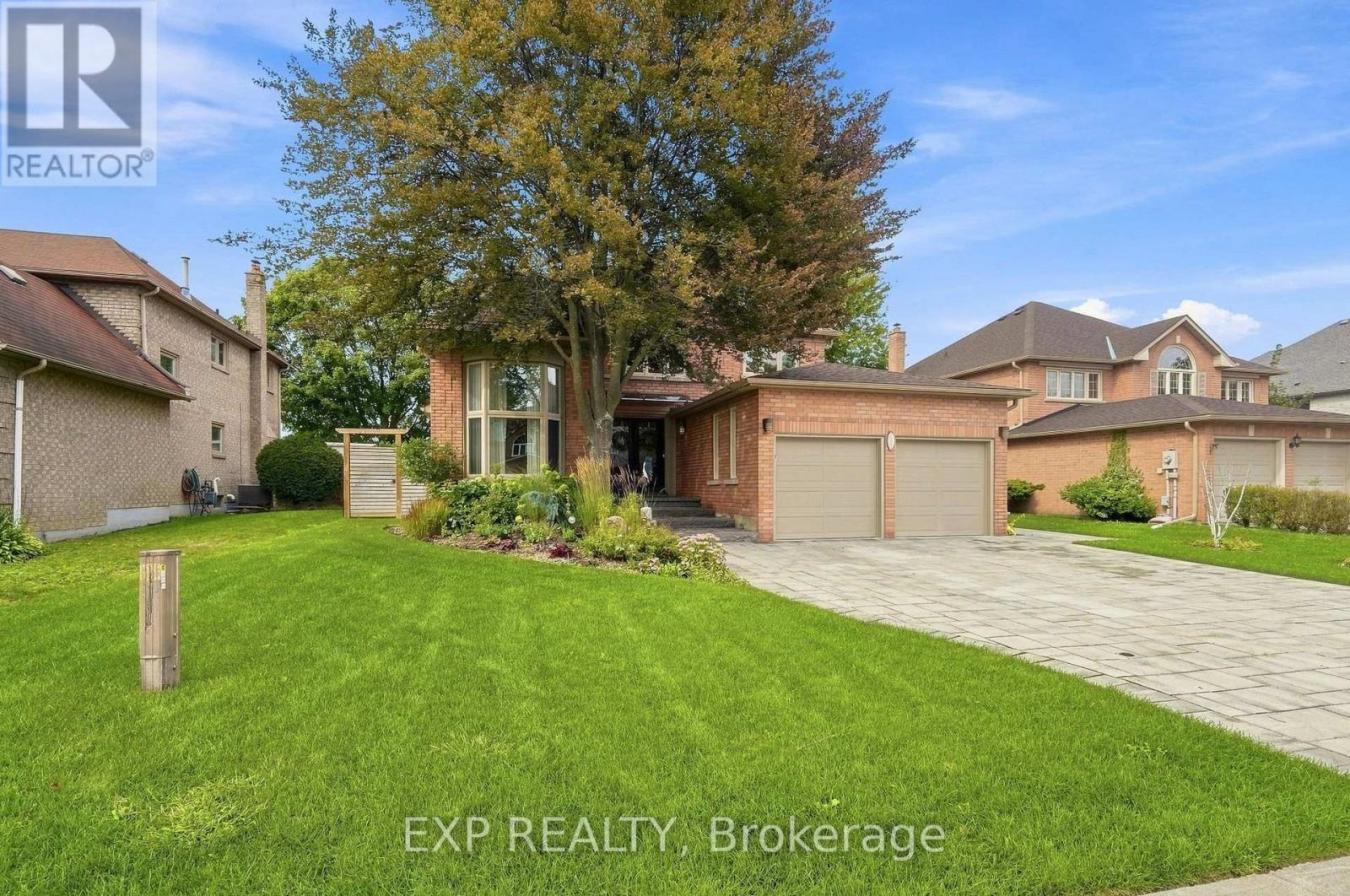 Front elevation with stone driveway