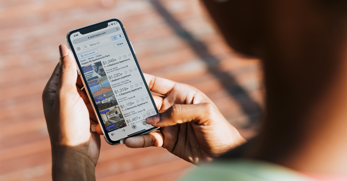 Person searching for an apartment for rent using a specialized internet listing service designed for rental properties.