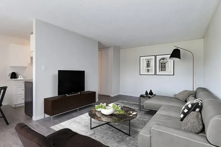 Inviting living room space at Berkeley Square in Lethbridge.