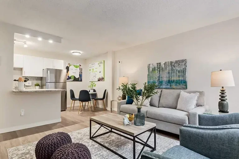 Open kitchen design connected to living space at The Winston in Calgary. 