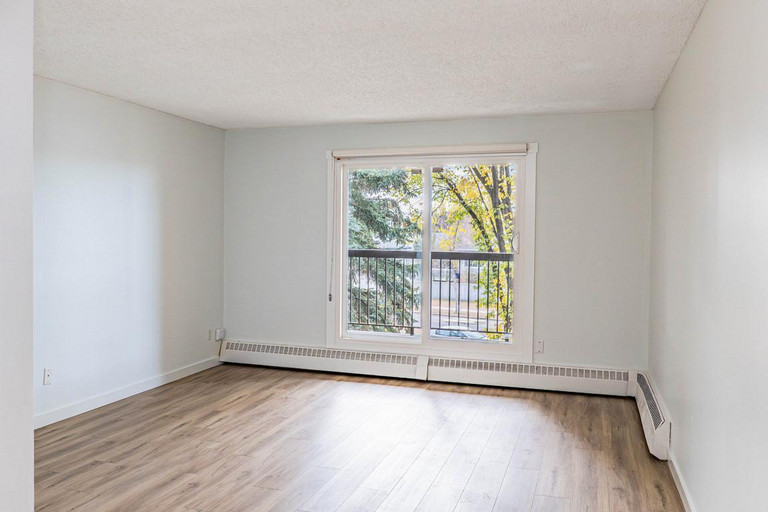Bright living room with natural light at Christopher County in Edmonton.