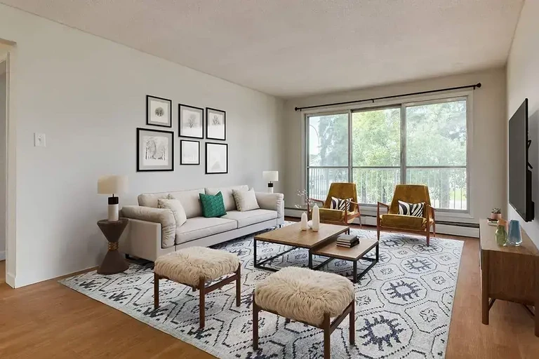 Bright living room with natural light at Christopher's Place in Edmonton.