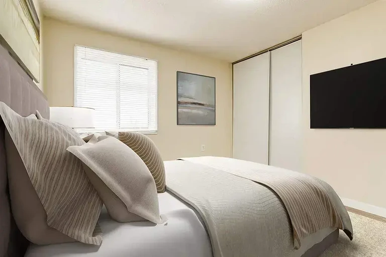 Good size bedroom at Cloverdale Apartments in Edmonton.