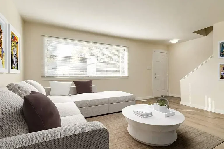 Inviting living room space at Delton Townhomes in Edmonton.