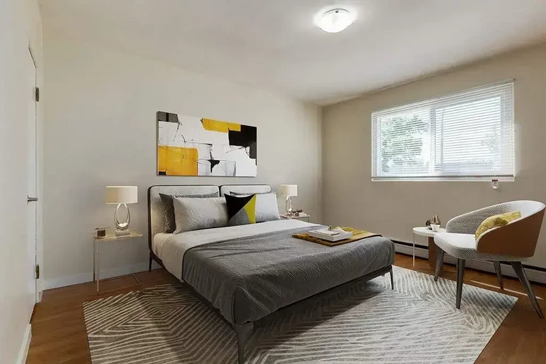 Comfortable size bedroom at Eastwood Apartments in Edmonton.