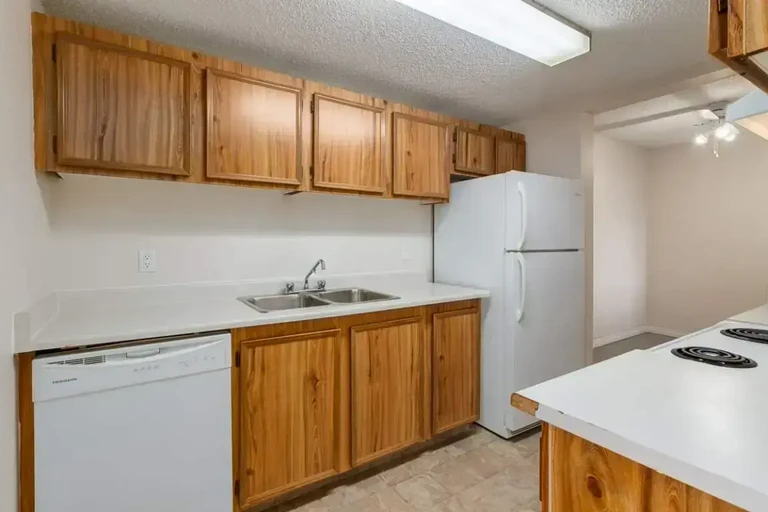 Galley style kitchen at Hooke County Townhomes in Edmonton.