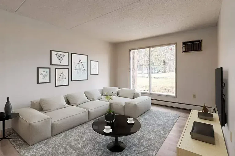 Inviting living room space at Palm Road Apartments in Lethbridge.