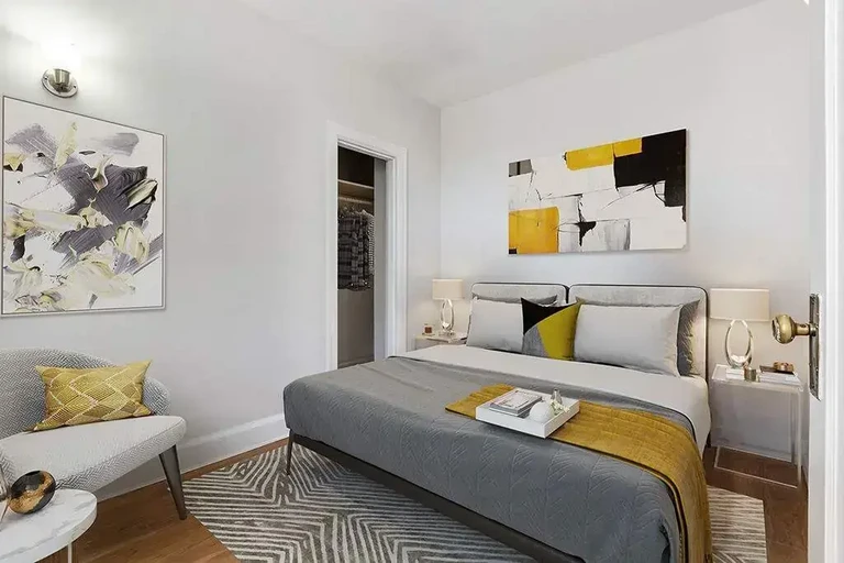 Comfortable bedroom at Chateau Apartments in Regina.