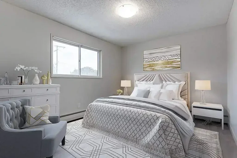 Comfortable size bedroom at Concord Apartments in Regina.
